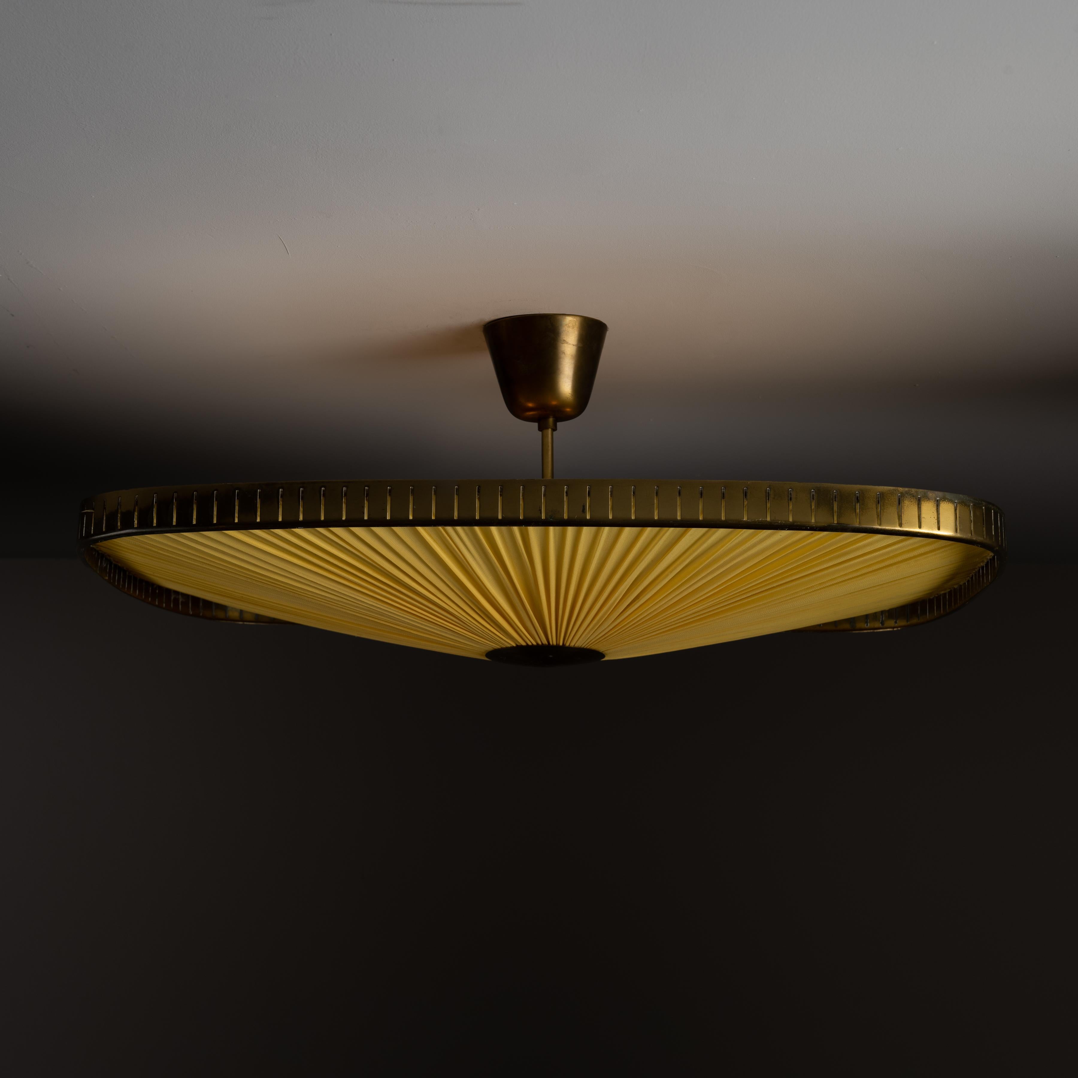 Model 11858 ceiling flush mount by Harald Notini for Arvid Böhlmarks Lampfabrik. Designed and manufactured in Sweden, circa 1950. Softened rectangular frame with an elegant pleated linen inlay. There are some minor holes and tears in the fabric