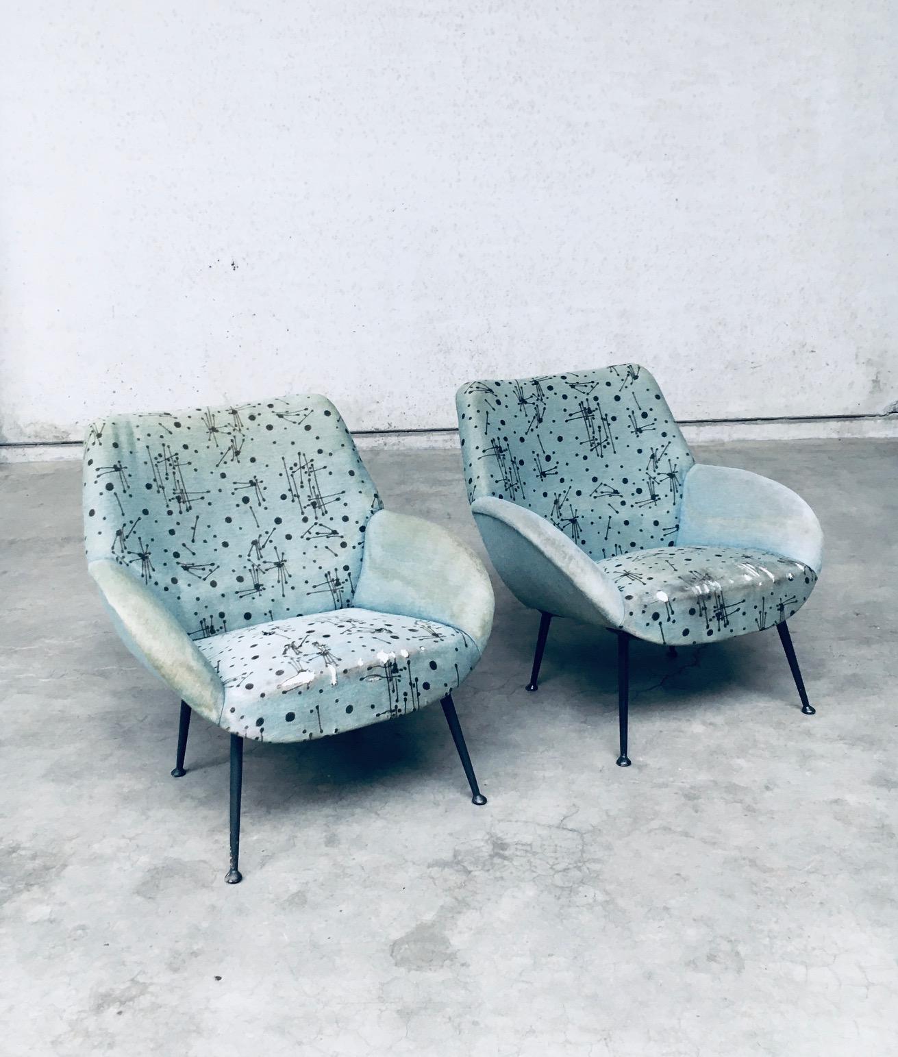 Vintage Midcentury Modern Dutch Design Model 121 Lounge Chair set of 2 by Theo Ruth for Artifort. Made in The Netherlands, 1956. All original set of arm chairs with original 'Atomic' 'Space Age' fabric on both chairs. Cast metal tapered legs with