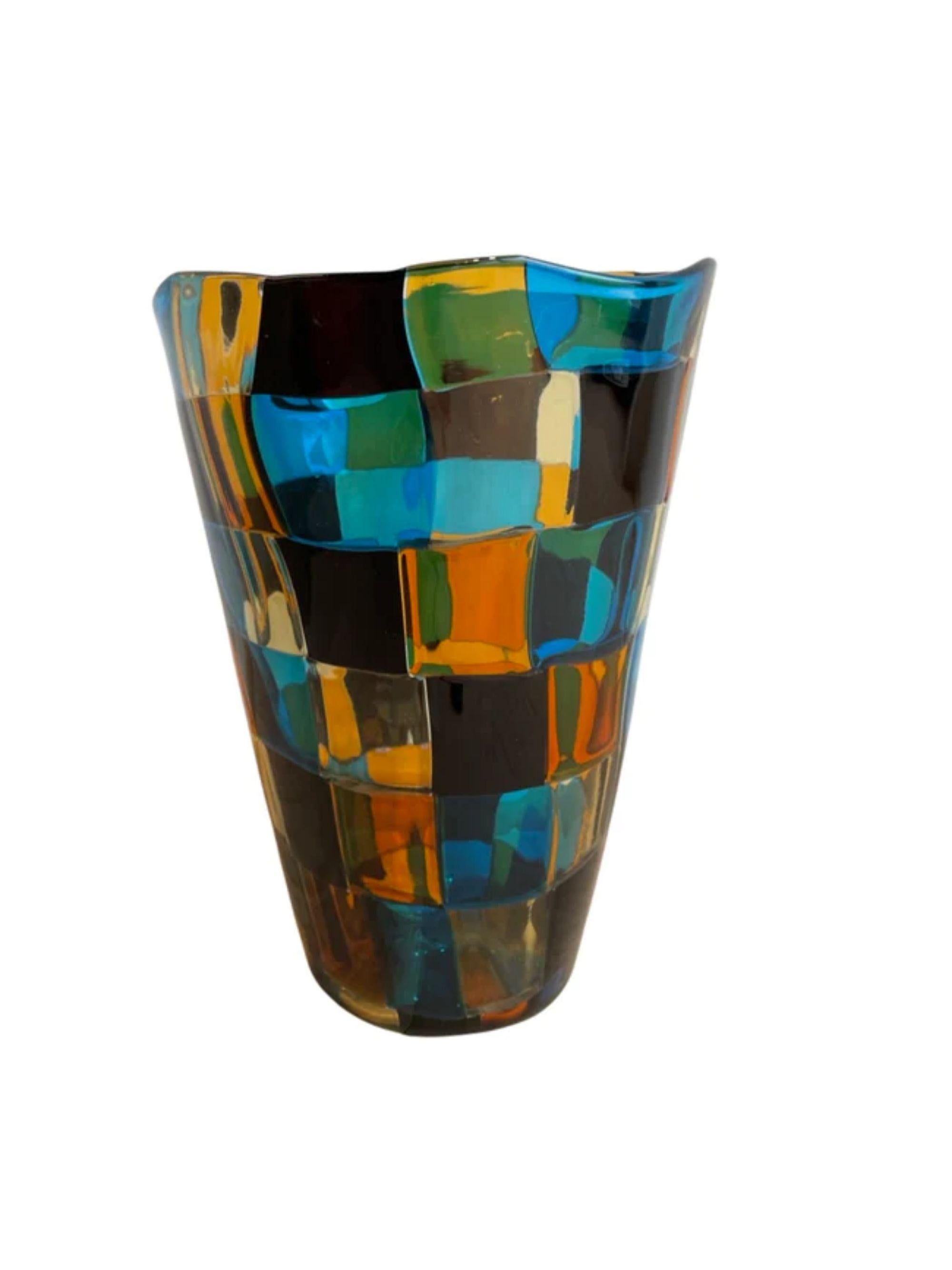 Fulvio Bianconi model 1329 “Pezzato” vase for Venini, Italy, 1950s

Additional Information:
Materials: Polychrome patchwork glass
Dimensions: 9 1/4