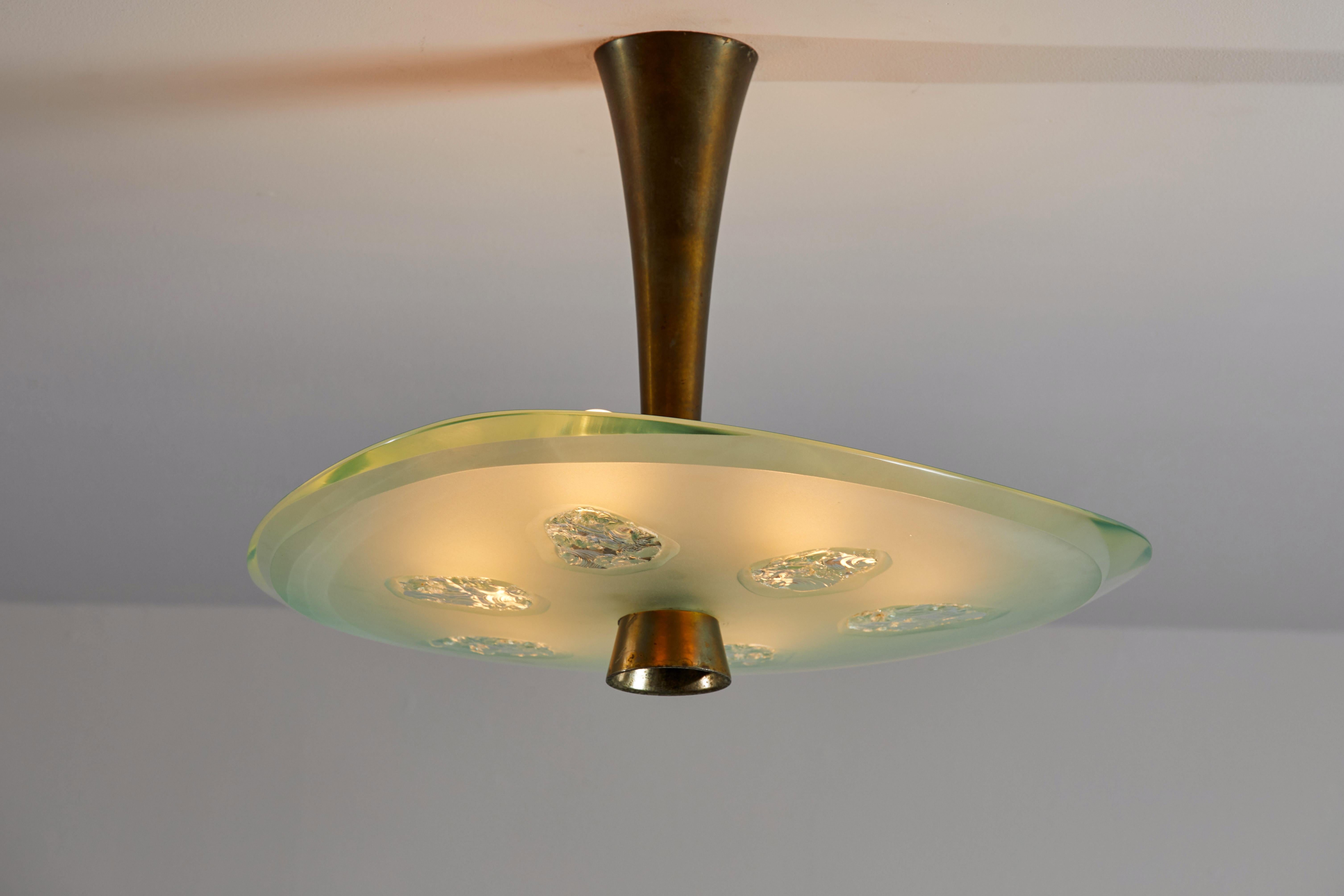 Model 1748 flush mount ceiling light by Max Ingrand for Fontana Arte. Designed and manufactured in Italy, 1959. Glass, brass. Rewired for U.S. junction boxes. Original canopy. Takes six E27 50w maximum bulbs. Bulbs provided as a onetime courtesy.