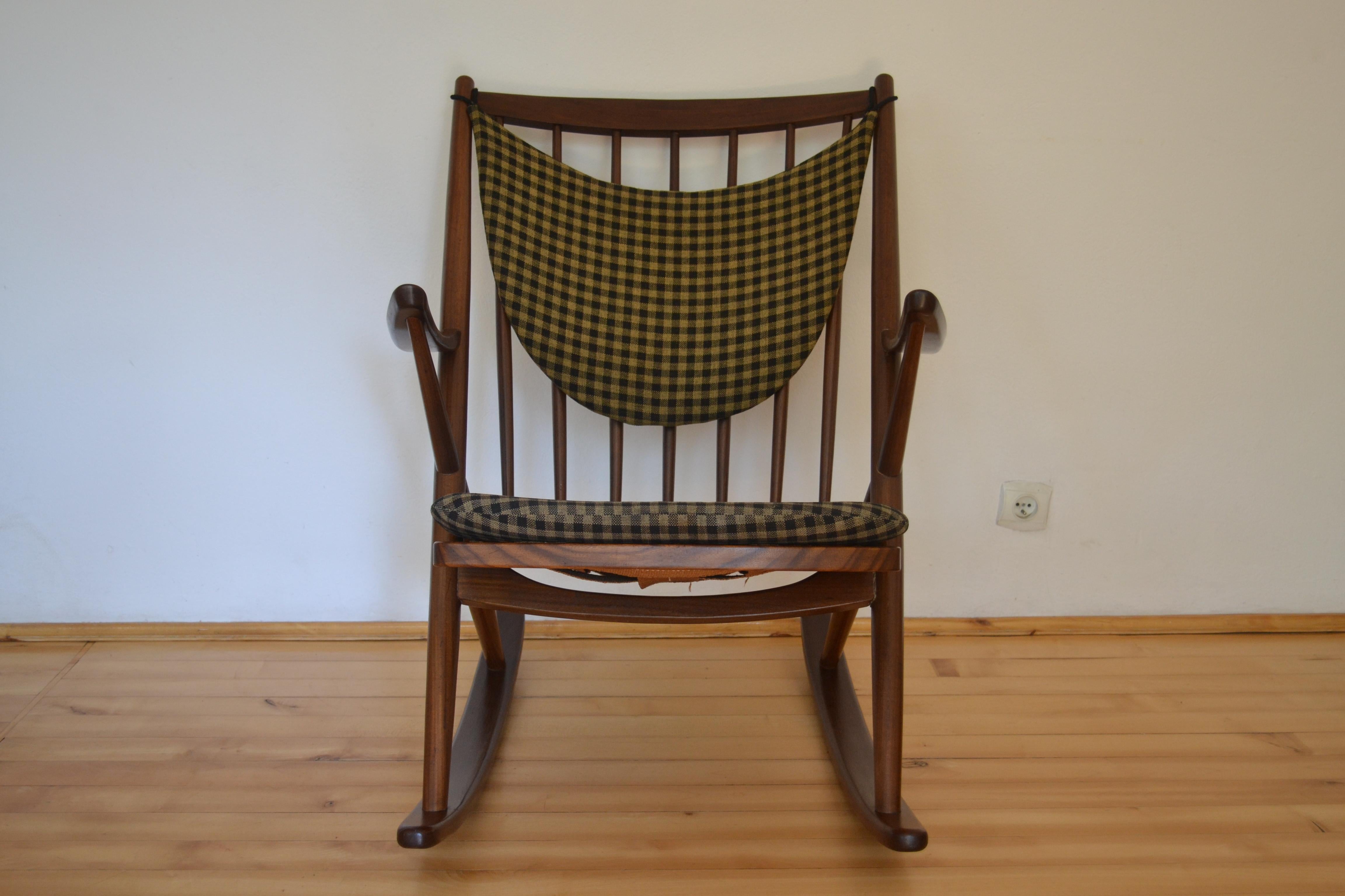 
This palisander rocking chair, model 182, was designed by Frank Reenskaug for Bramin, circa 1960.