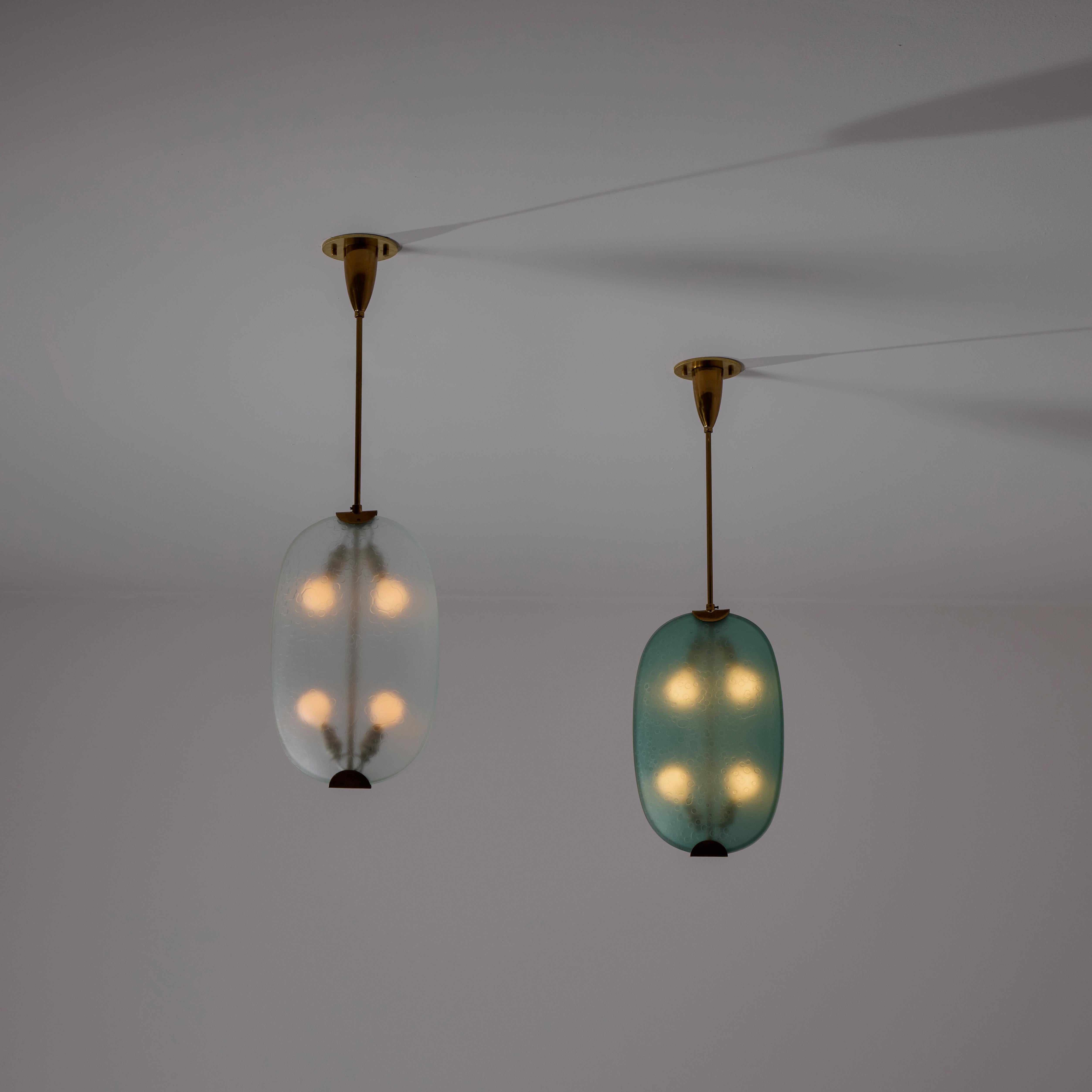 Model 1933 Ceiling Light by Max Ingrand for Fontana Arte. Manufactured in Italy, circa the 1950s. Textured glass panels meet to form a slim curved rectangle body. The gorgeous aged brass stem gives this an elegant and simple feel to the ceiling