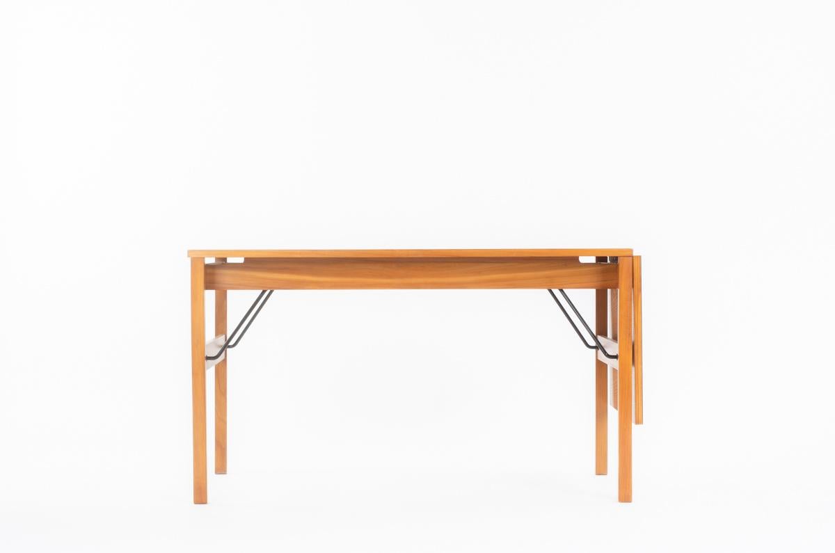 Dining table by Alain Richard for Meuble TV in 1954
Model: 200
Structure with rectangular top in elm
parts in metal
Extension in black laminate
Famous model
Length: 130 cm (without extension) - 180 cm (with extension)