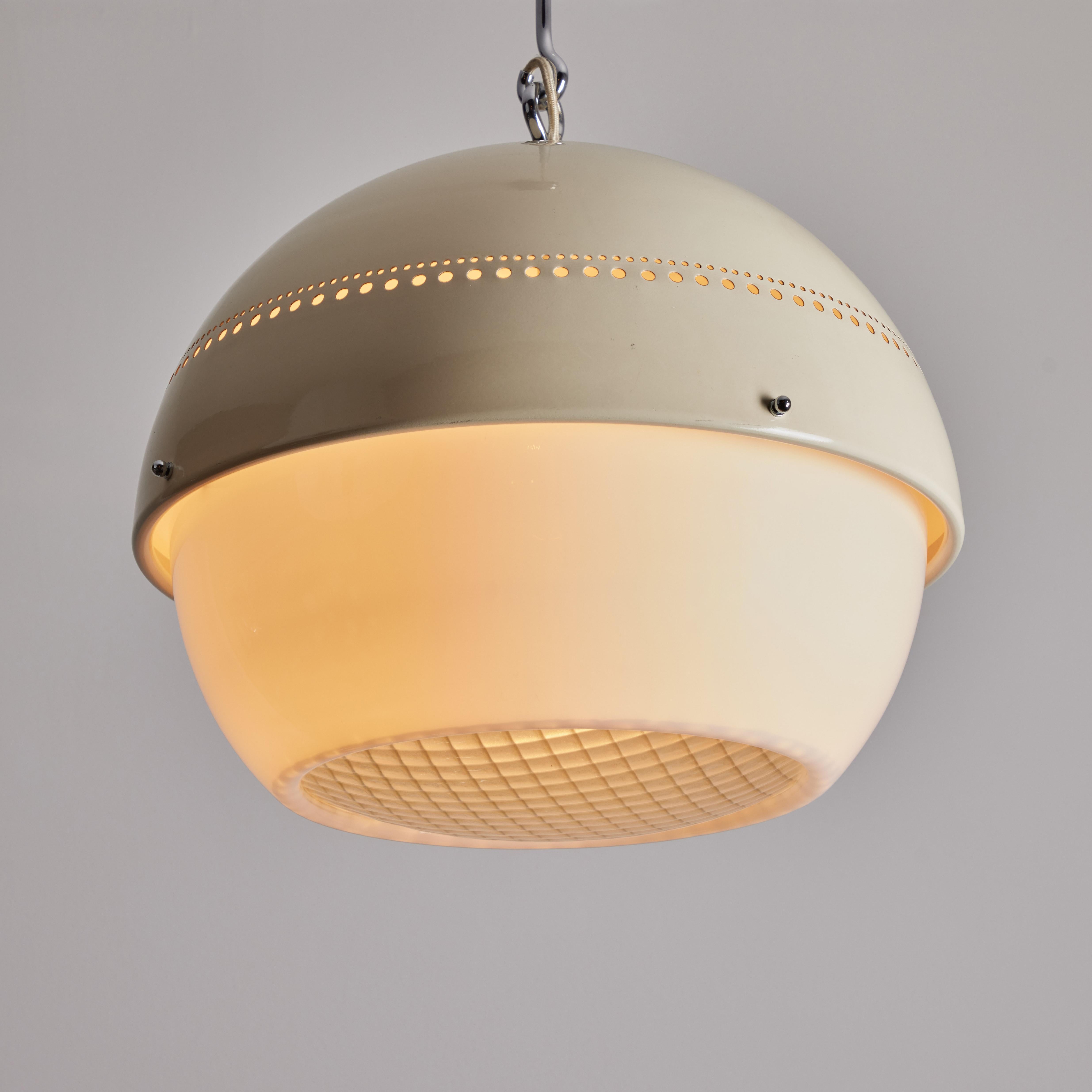 Model 2048 Ceiling Light by Sergio Asti and Gino Sarfatti for Arteluce. Designed and manufactured in Italy circa the 1950s. Enameled metal spun perforated shade paired with a milky acrylic diffuser band. The bottom diffuser is textured plexiglass.