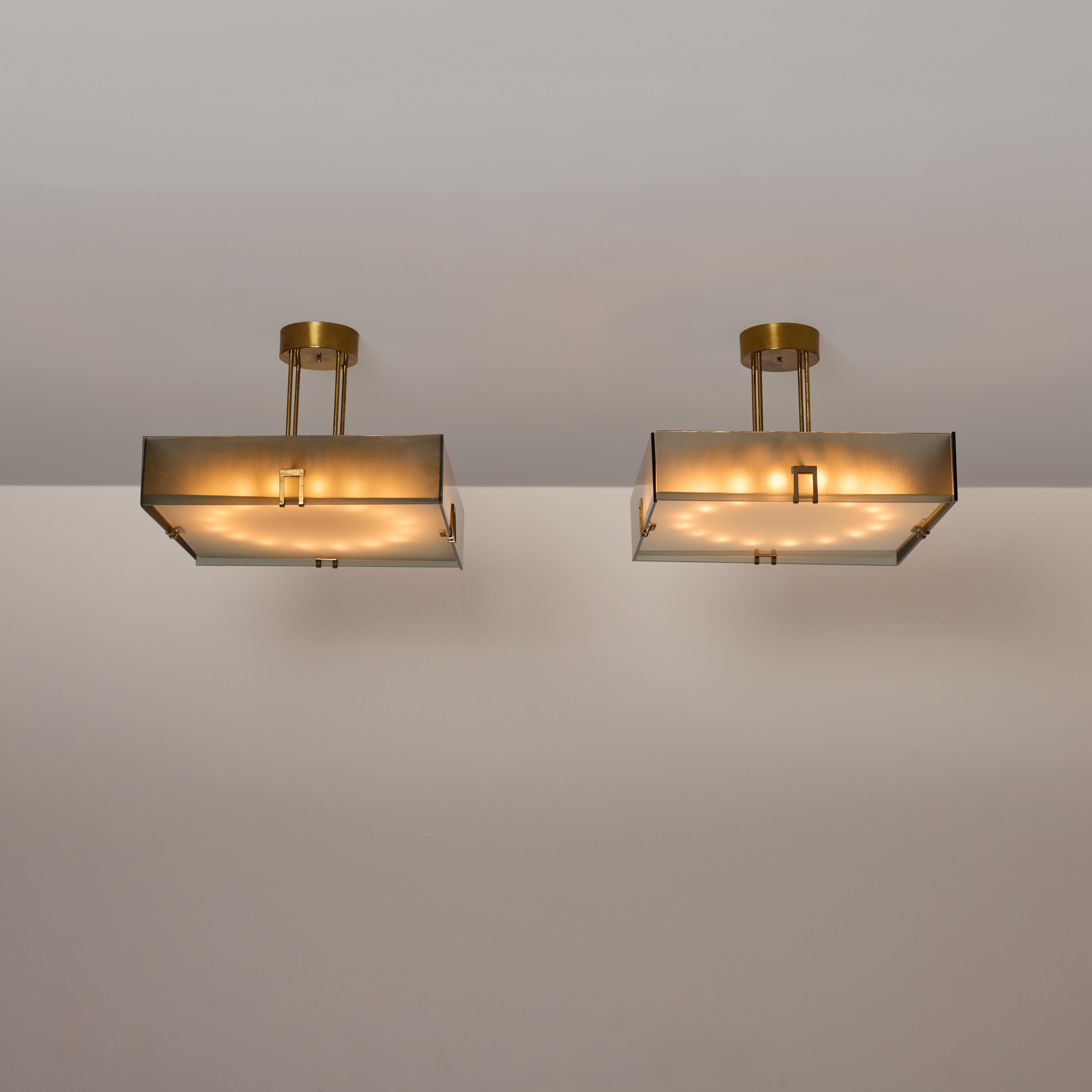 Single Model 2098.2 by Max Ingrand for Fontana Arte. Designed and manufactured in Italy, circa the 1960s. Smoked grey tinted panels paired with an etched bottom diffuser. Fixture holds four E27 socket types, adaptyed for the US. We recommend a