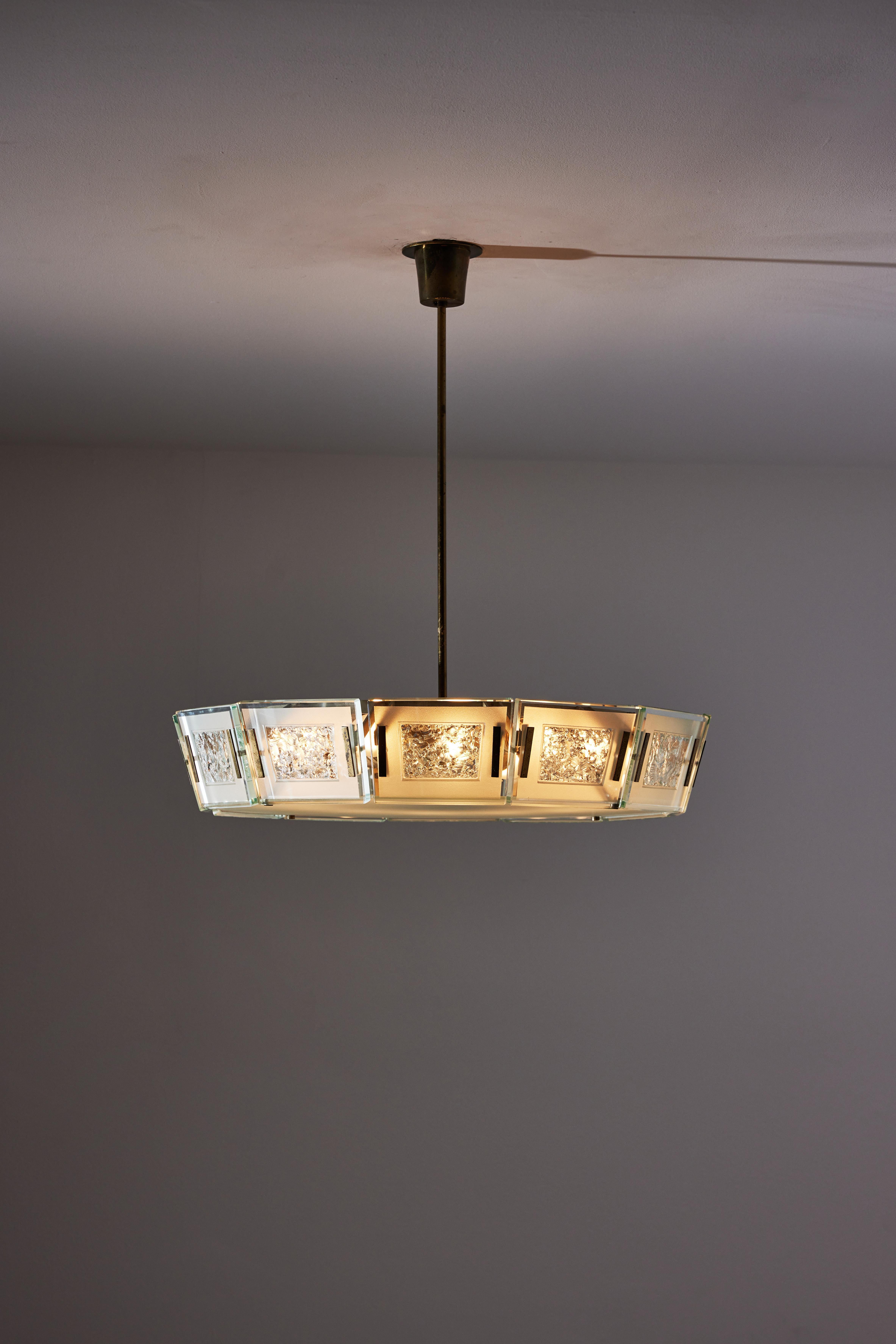 Model 2270 ceiling light by Max Ingrand. Designed and manufactured in Italy, circa 1950s. Satin finish crystal glass diffuser with satin finish crystal chiseled panels. Brass stem and custom brass ceiling plate. Rewired for U.S. standards. We