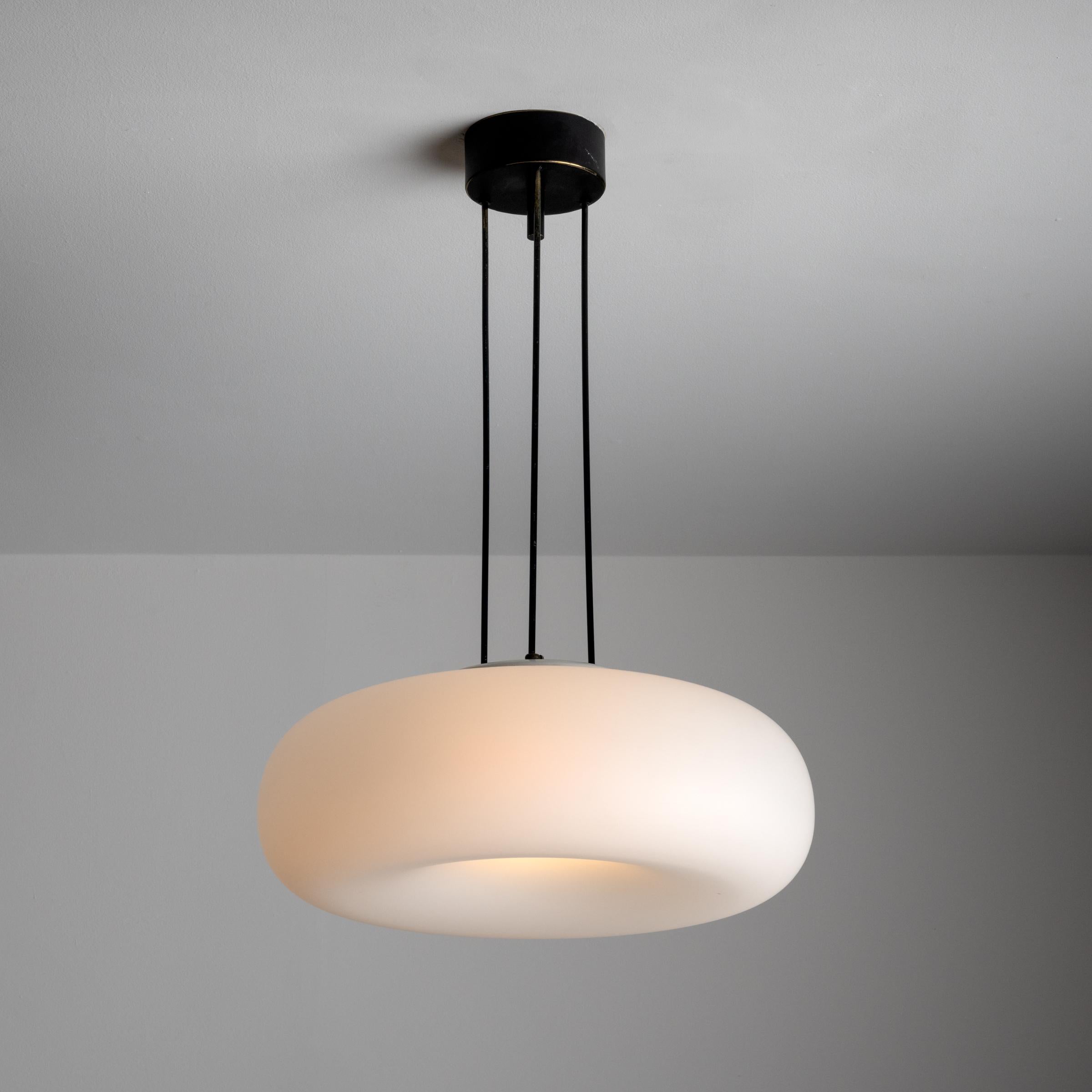 Model 2356 ceiling light by Max Ingrand for Fontana Arte. Designed in Italy in 1967. Features a large frosted glass shade with a concave bottom. Wired for the US. We recommend one E27 base 75w maximum bulb.