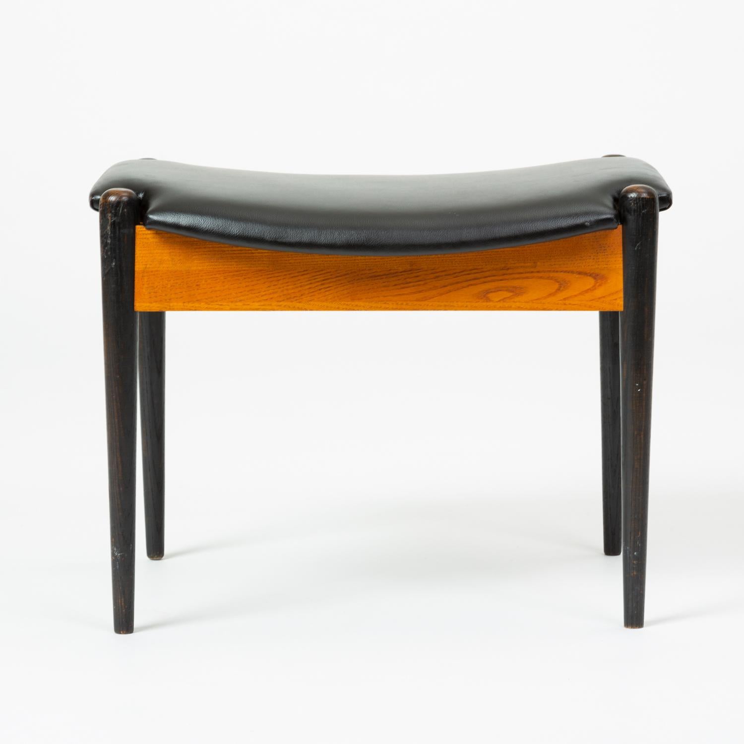Marketed as the #3007 “Single Bench” in 1965, this versatile design by Arthur Umanoff functions as a stool, ottoman, or children’s seating. A hallmark of this series for Washington Woodcraft, tapered dowel legs with rounded upper ends sit at each