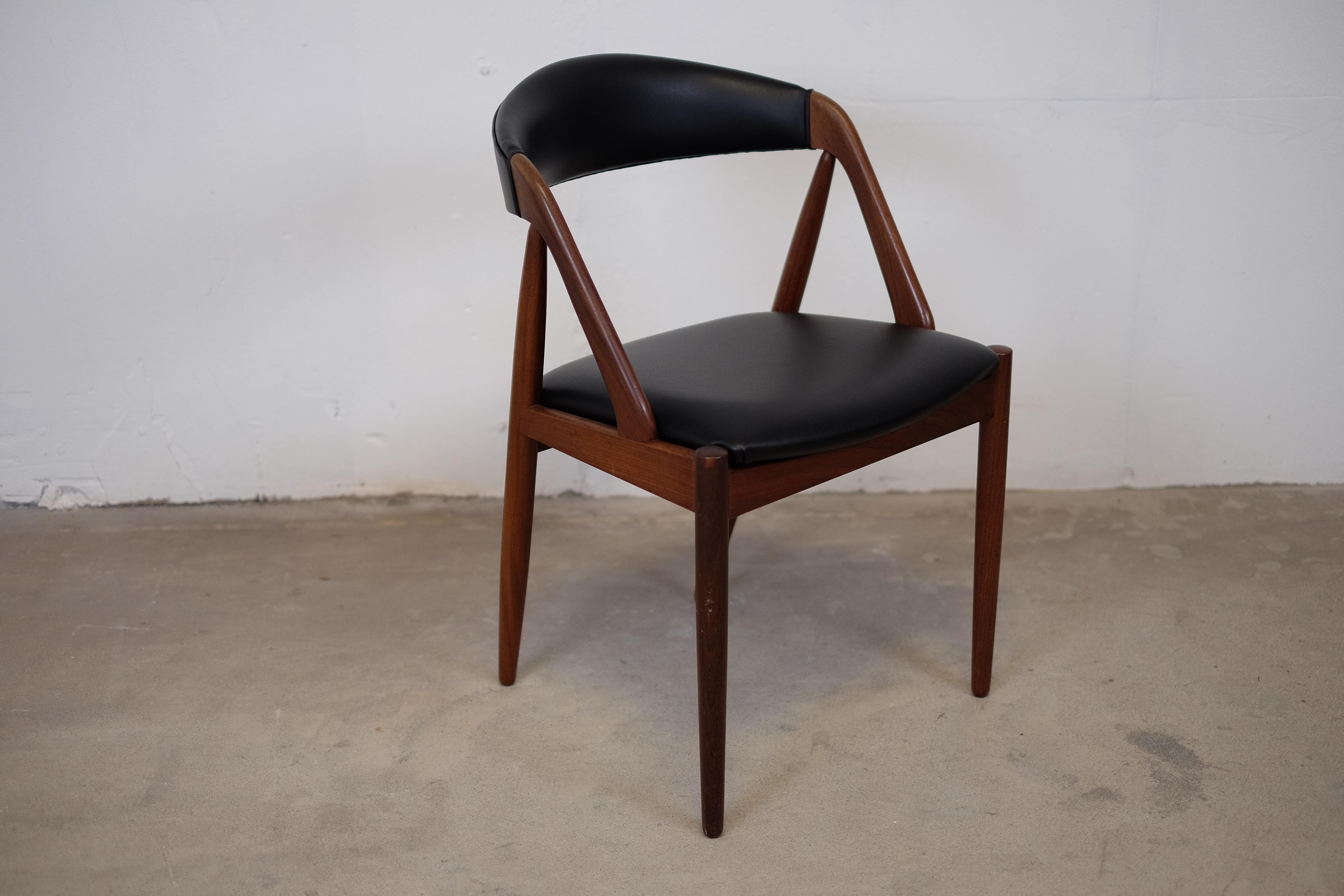 Stunning midcentury chairs ‘Model 31’ in teak by the Danish designer Kai Kristiansen for Schou Møbelfabrik, in 1956 and produced in the 1960s.

This stunning chairs are re-upholstered with real black leather. We have a lot more model 31 chairs in
