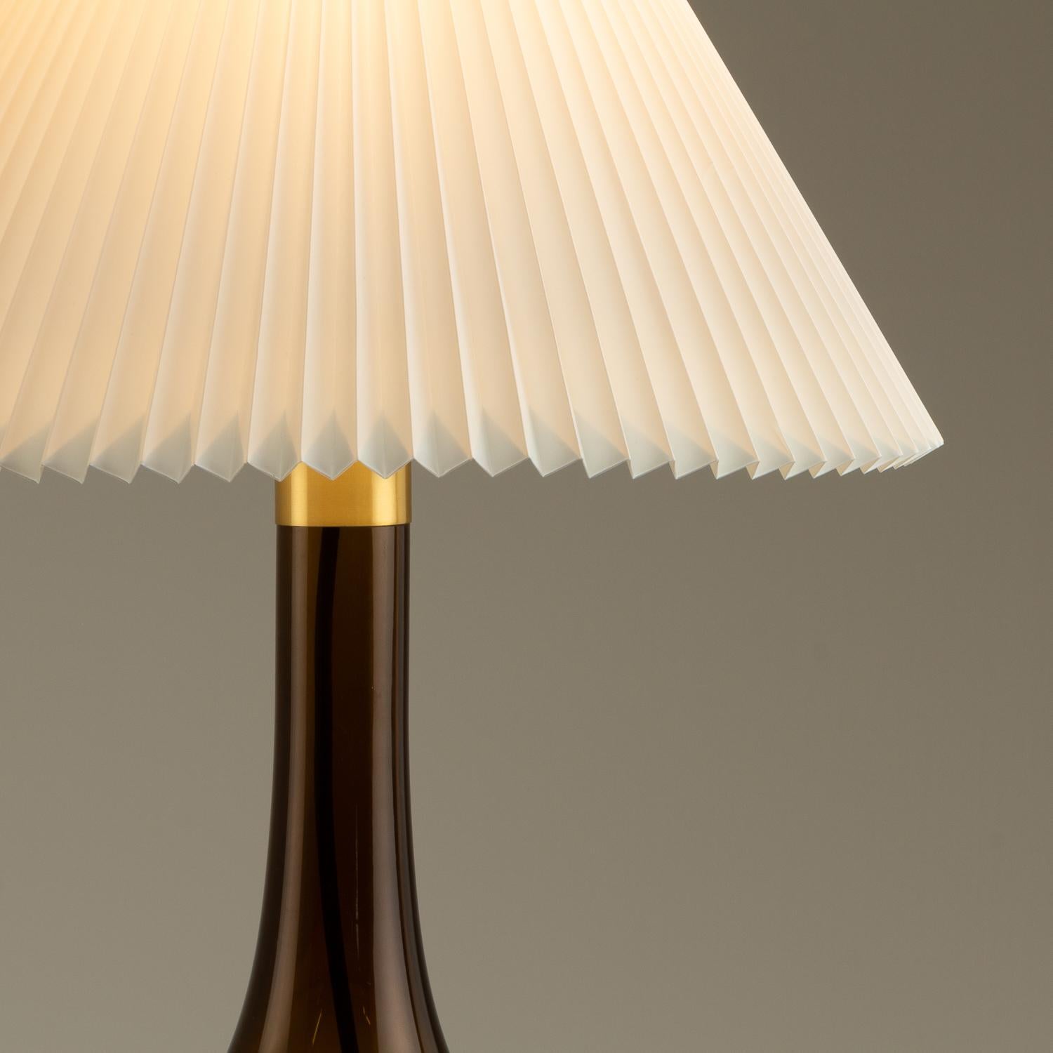 A Model 363 Holmegaard brown smoked glass table lamp designed by Poul Christiansen for Le Klint, Denmark, 1960s. Original Le Klint lampshade.

 