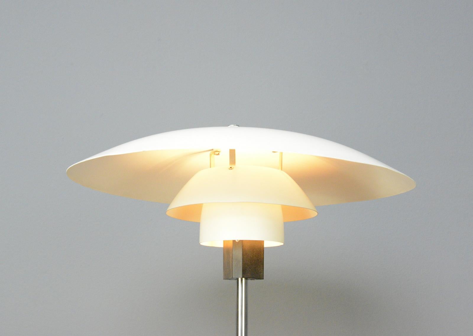 Model 4/3 Table Lamp By Louis Poulsen Circa 1960s

- Chromed steel base and stem
- On/Off switch on the base
- Stepped steel shade
- Takes E27 fitting bulbs
- Designed by Poul Henningsen
- Produced by Louis Poulsen
- Danish ~ 1960s
- 45cm wide x