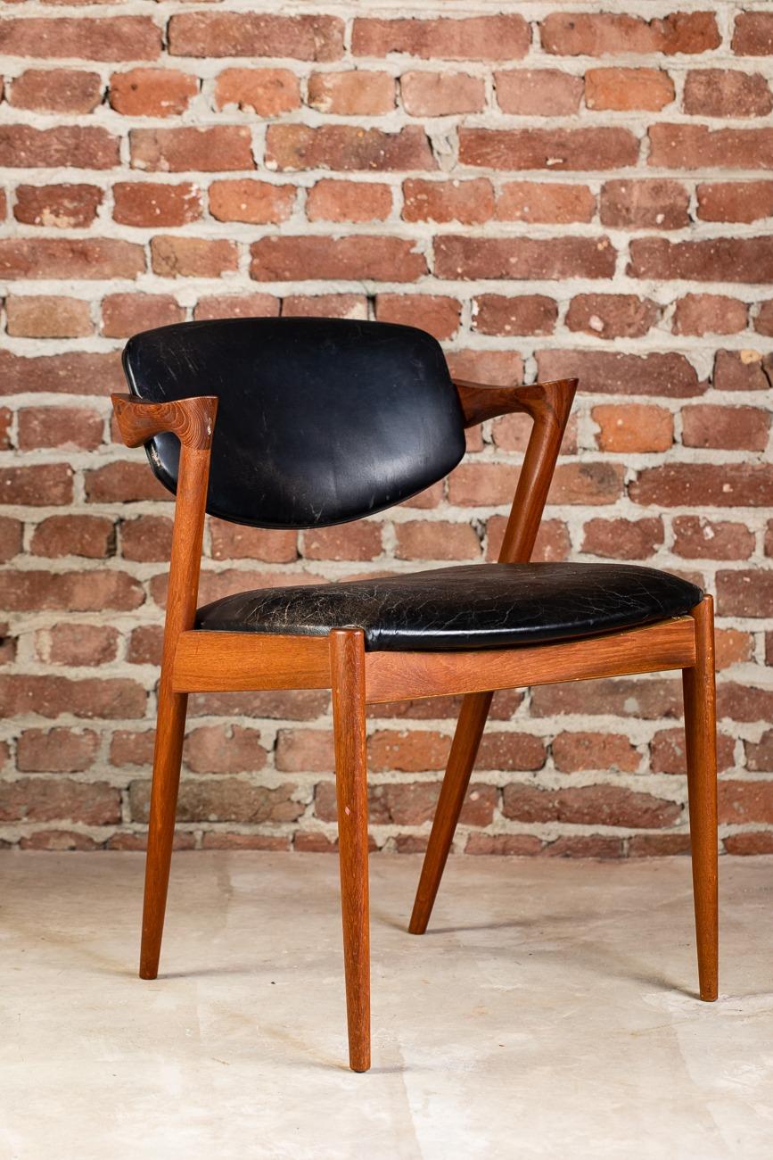 Model 42 Chair in Teak Wood and Leather by Kai Kristiansen, Denmark, 1960

Additional information:
Country of Manufacture – Denmark
Design Period – 1960
Production Period – 1960
Style – Midcentury / Danish Design
Designer – Kai Kristiansen
Model –