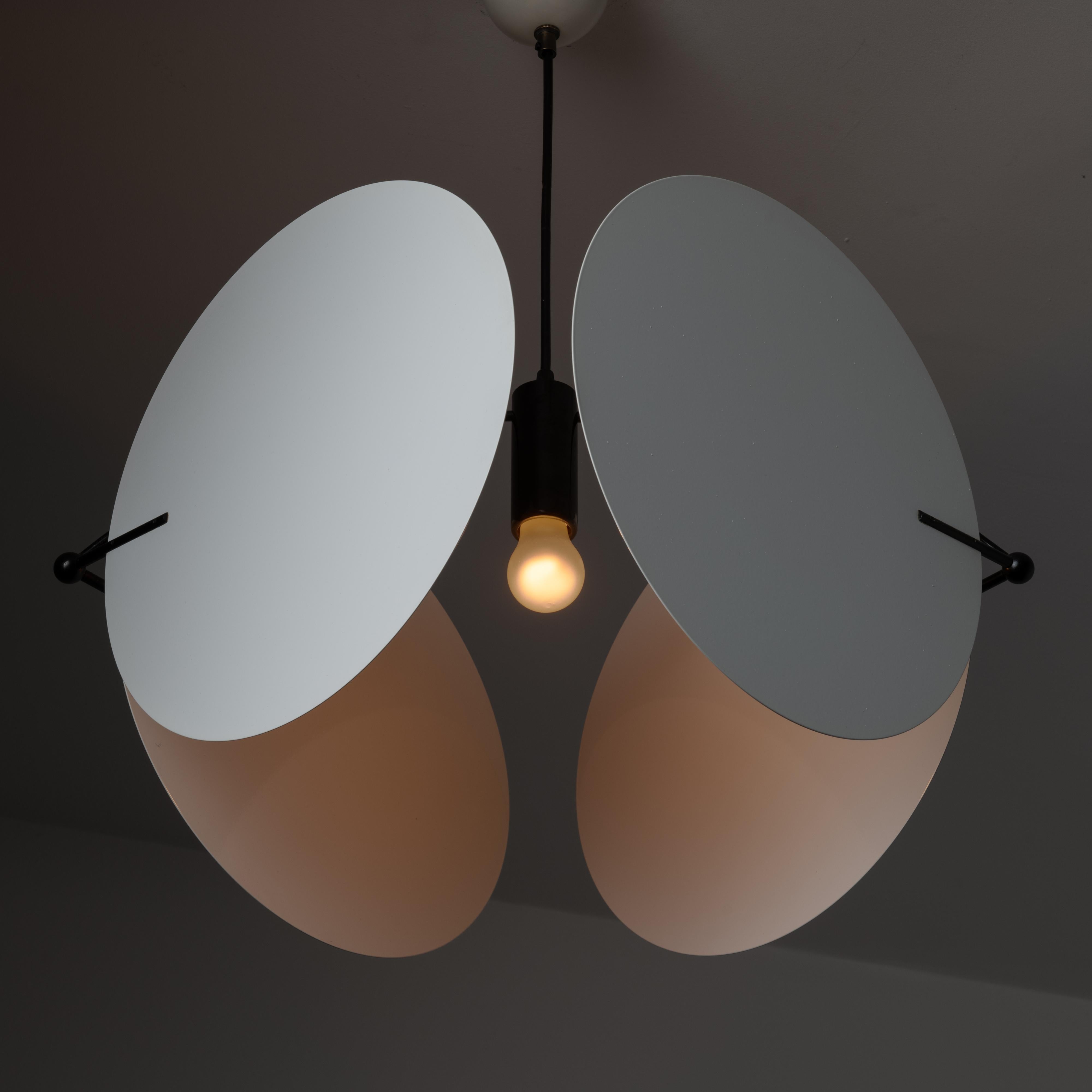Model 460 'Monet' Ceiling Light by Vico Magistretti for Oluce. Designed and manufactured in Italy, circa the 1970s. A geometric contemporary pendant consisting of four flat circular shapes floating in perpendicular forms. All four panels are held by