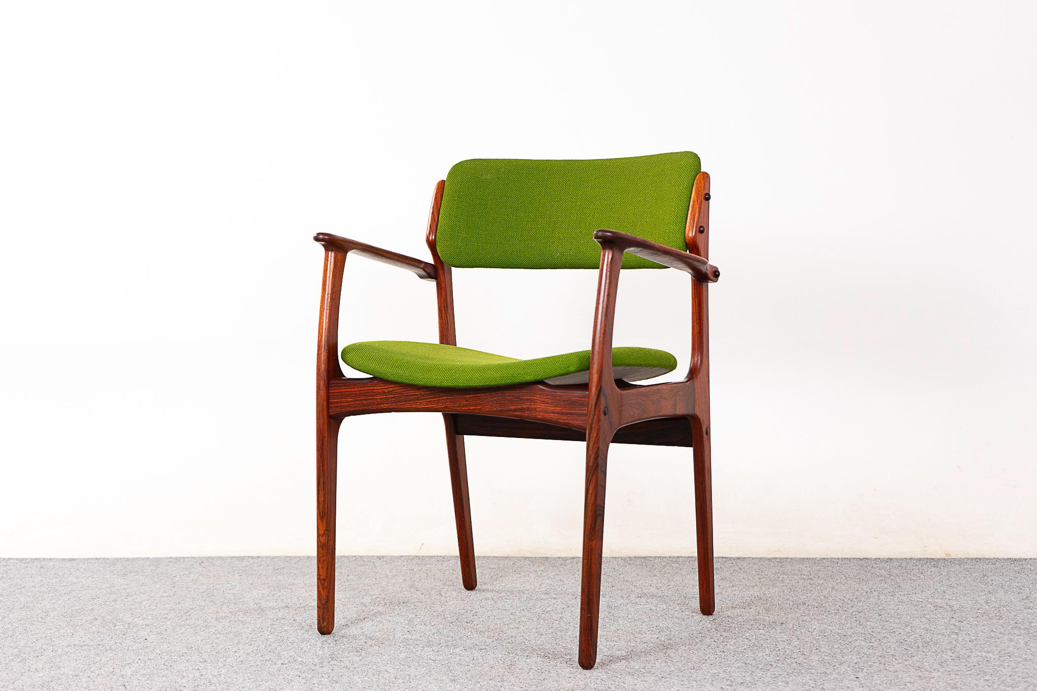 Rosewood Model 50 armchair by Erik Buch for Domus Danica, circa 1960's. Beautifully sculpted frame with stunning wood grain, comfort without an imposing footprint! Elegant floating bottom design. Makers mark intact. Original upholstery with minor