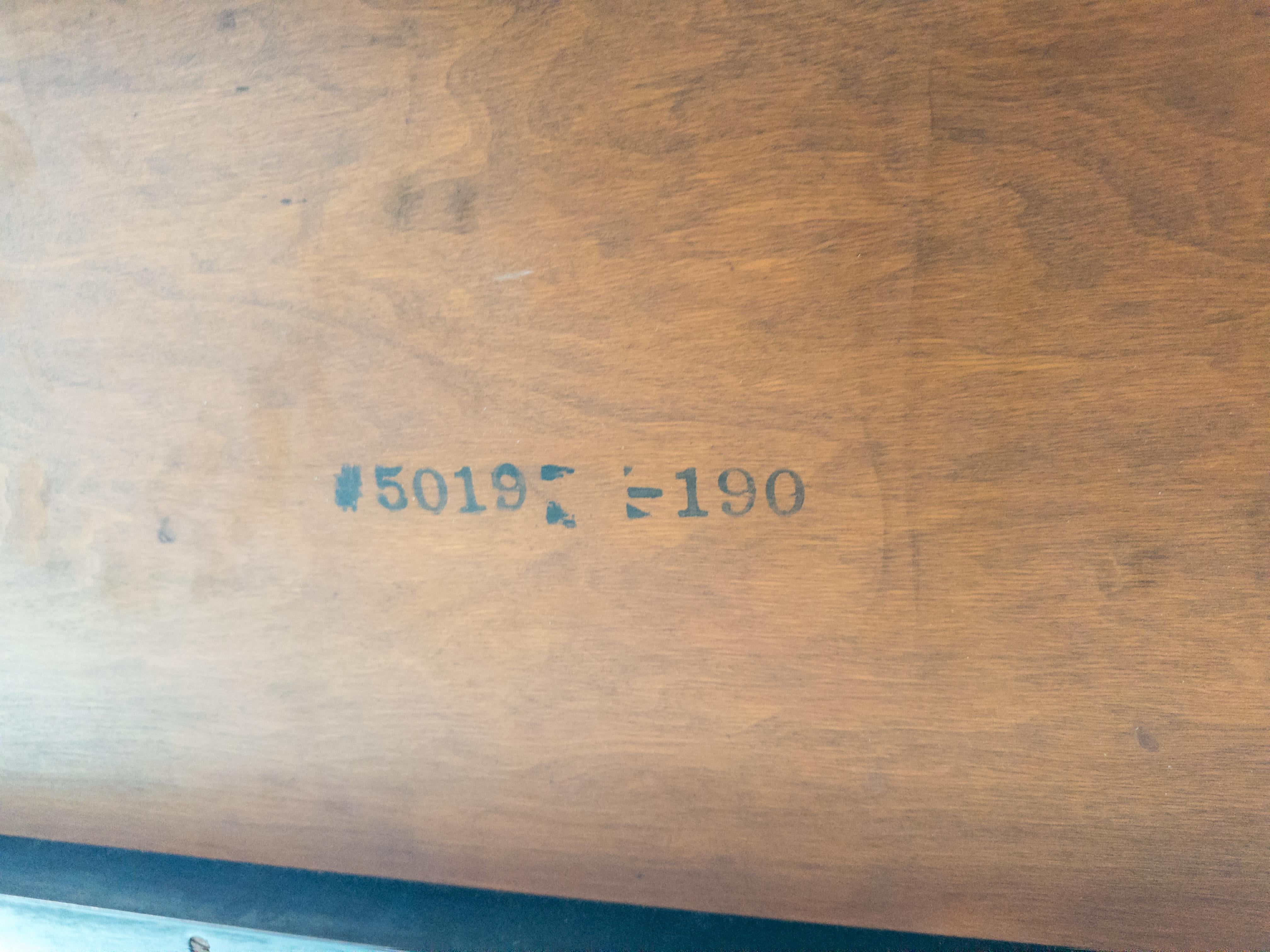 Model 5019 Two-tier console table by Paul T. Frankl for Johnson Furniture Company. Piece is made with lacquered cork and mahogany with original stenciled manufacturer's mark to underside.

