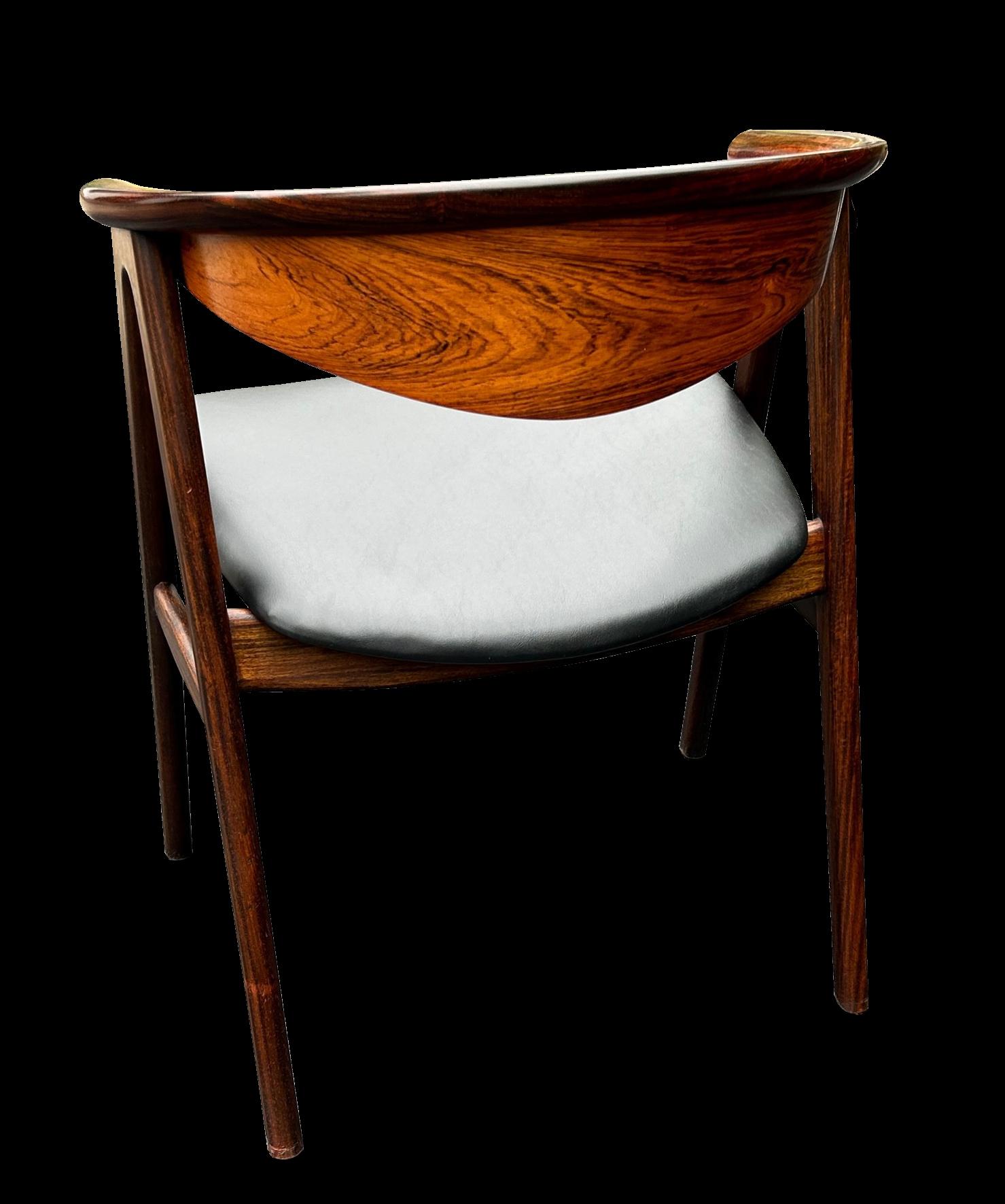 This is a particularly good example of this scarce chair by Erik Kirkegaard , it has beautifully marked grain on the solid rosewood used to make it, and it is in fantastic condition.
