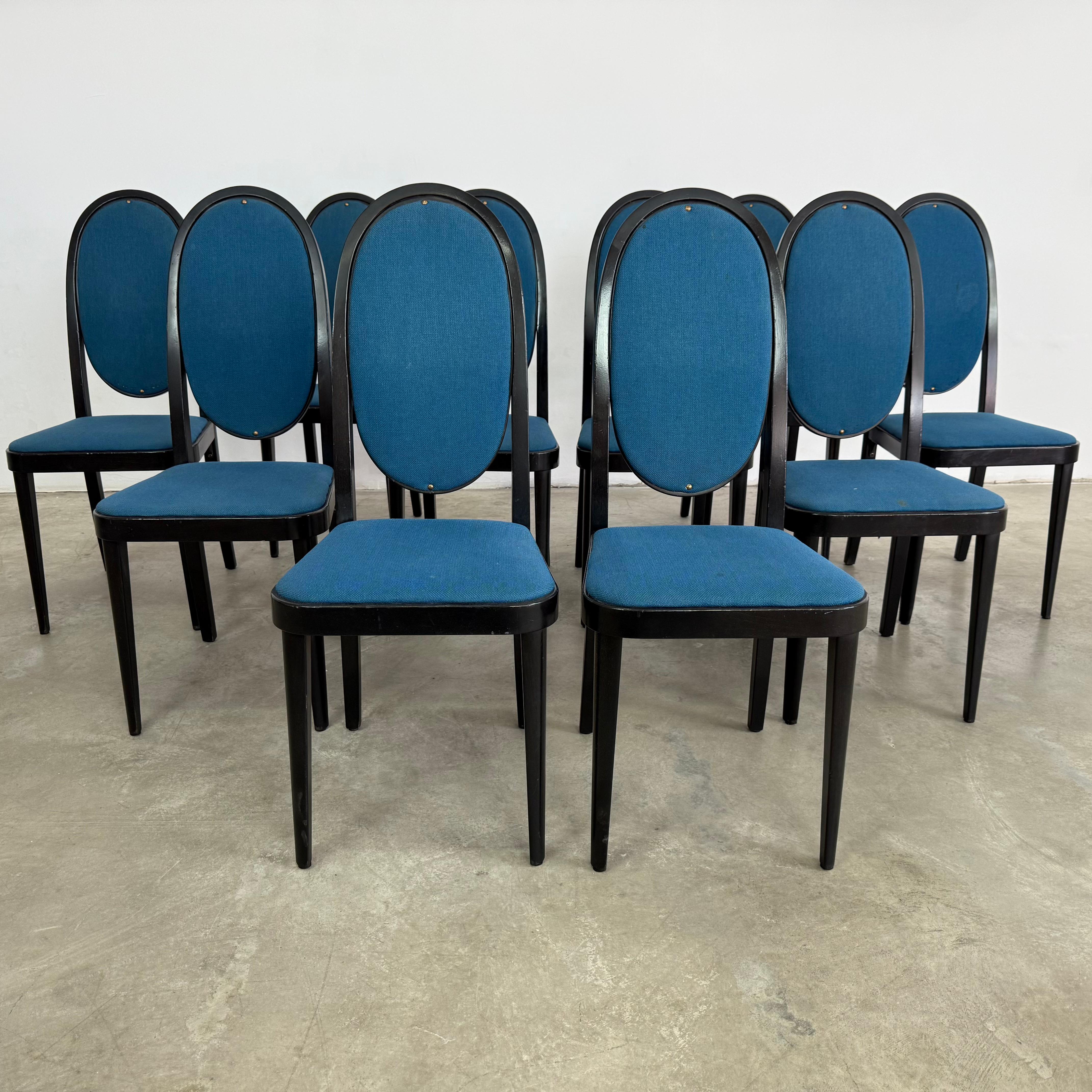 Dimensions: H 40” x W 17.3” x D 21” x SH 18.7”

Set of 10 high back dining chairs by Otto Prustscher for Thonet, model 567 with original blue fabric. Vintage furniture is great for the environment, for your home and for your wallet. A wonderful