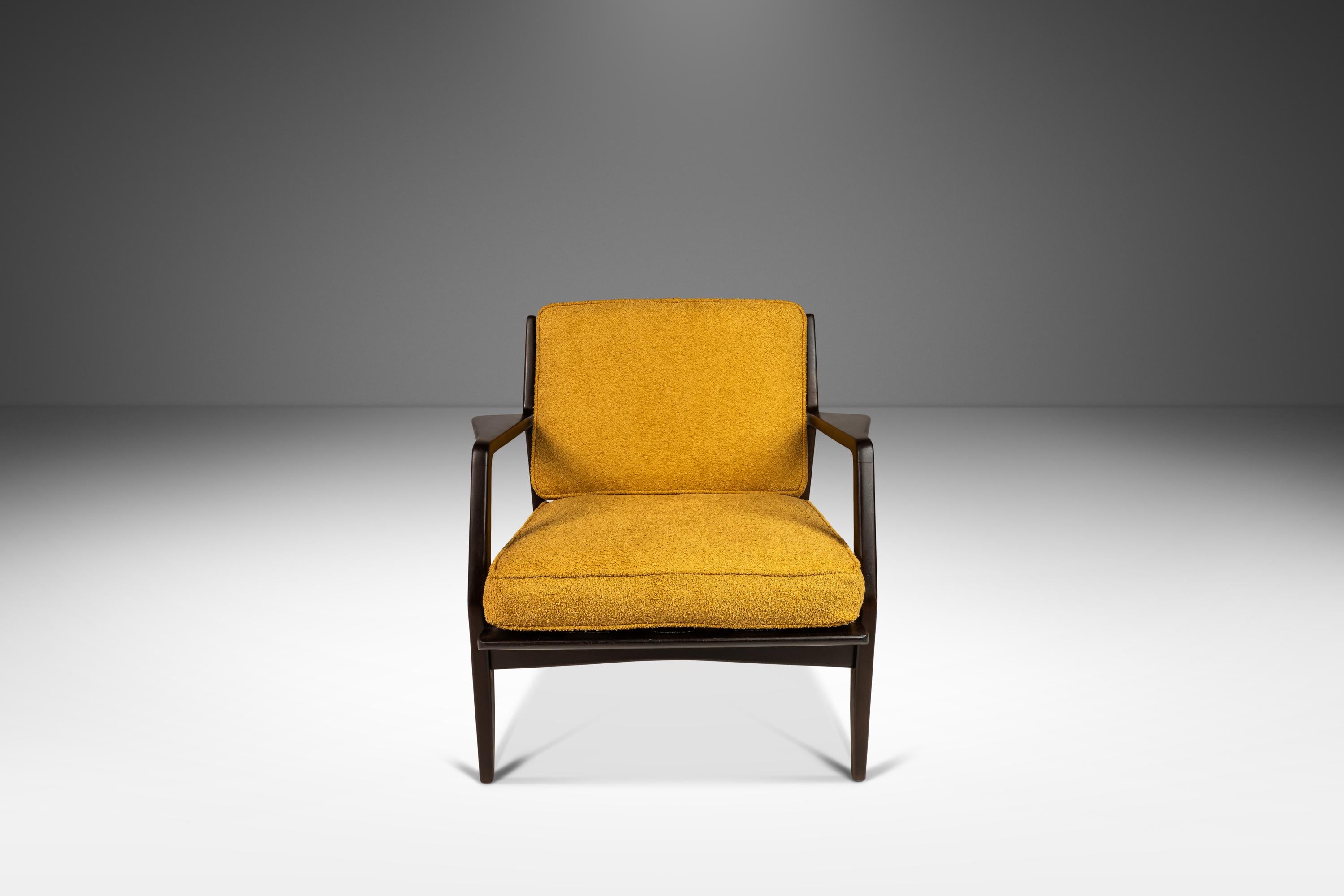 Introducing an ultra-rare Model 596 Lounge Chair in solid Beech originally designed by the renowned Lawrence Peabody for Selig. This iconic armchair has recently been fully restored and newly upholstered in a fabulous faded Canary yellow cotton