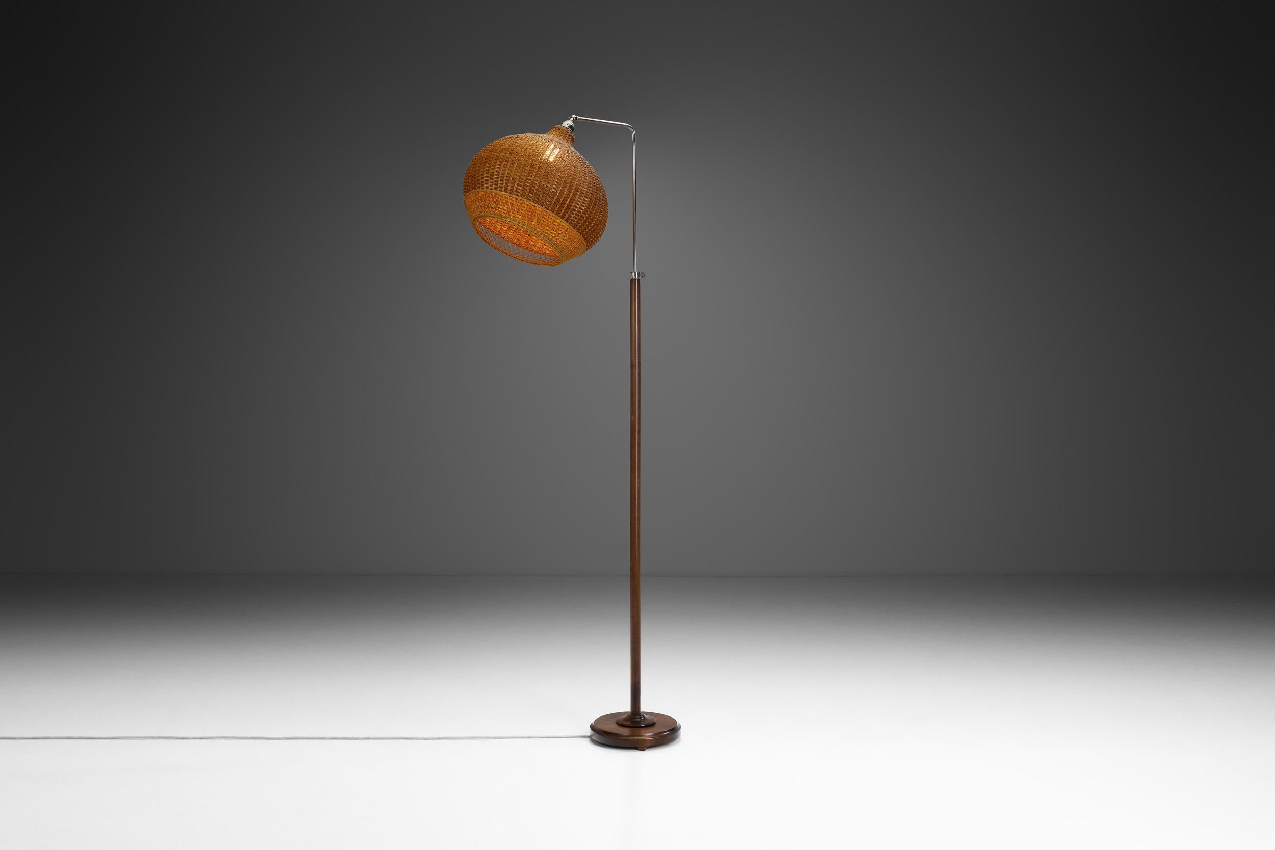Idman Oy, the legendary Finnish design company founded in 1909, gained a reputation for producing high-quality furniture and lighting pieces that embodied the principles of functionality and aesthetic simplicity. This Model 60442 floor lamp is a