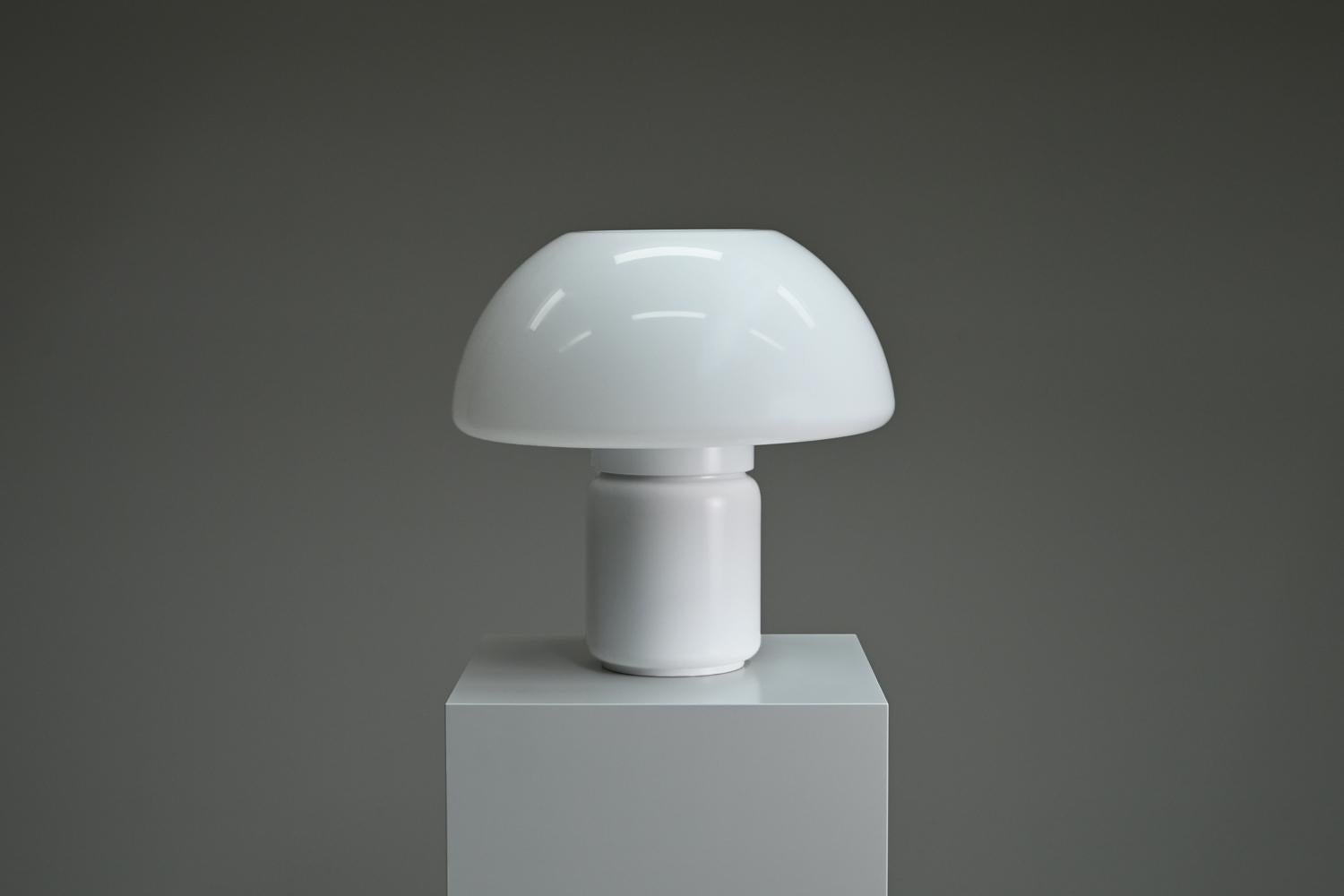 Model 625 table lamp by Elio Martinelli for Martinelli Luce, 1970s Italy. Designer Elio Martinelli Known for his innovative and sculptural lighting designs, Martinelli created this piece with a simple yet striking form that embodies the essence of