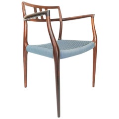 Model 64 Rosewood Armchair by Niels Moller
