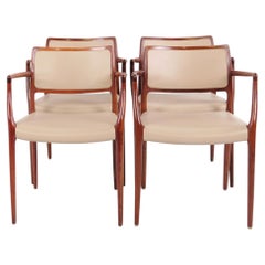 Model 65 Armchair in Rosewood with Light Elegance Leather by N.O. Møller