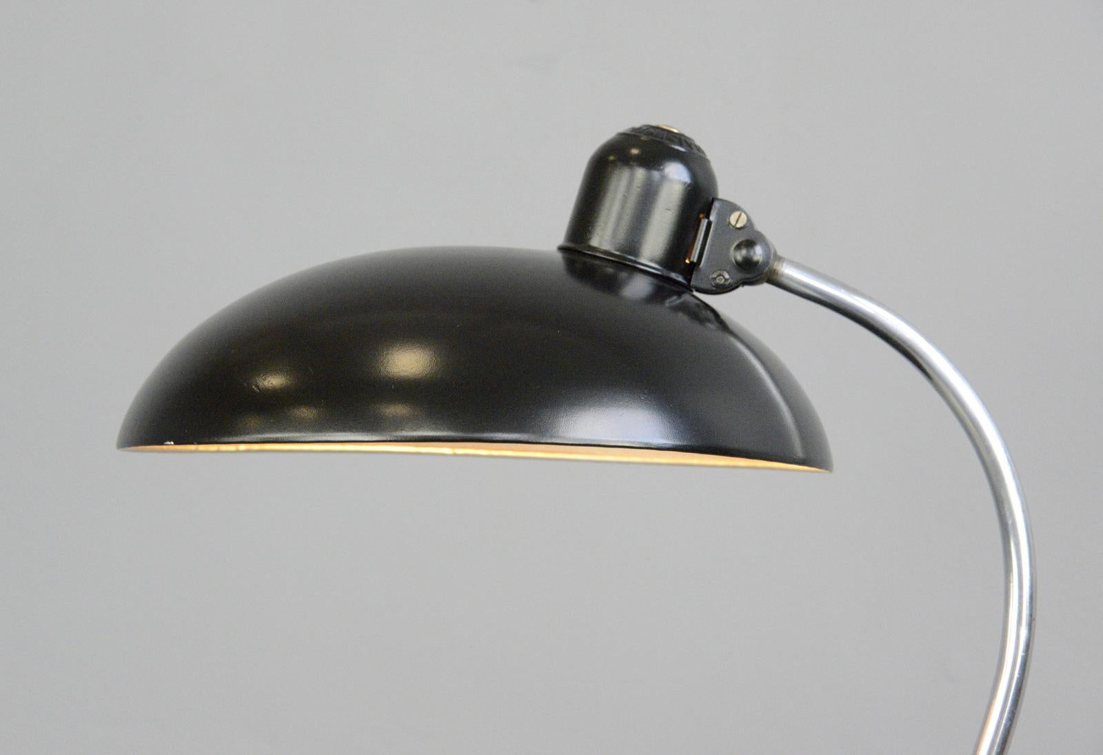 Model 6630 table lamp by Kaiser Idell, circa 1930s

- Chrome S shaped arm
- Steel shade with Kaiser Idell relief branding
- Takes E27 fitting bulbs
- Adjustable arm and shade
- Designed by Christian Dell
- Produced by Kaiser Idell
- Model