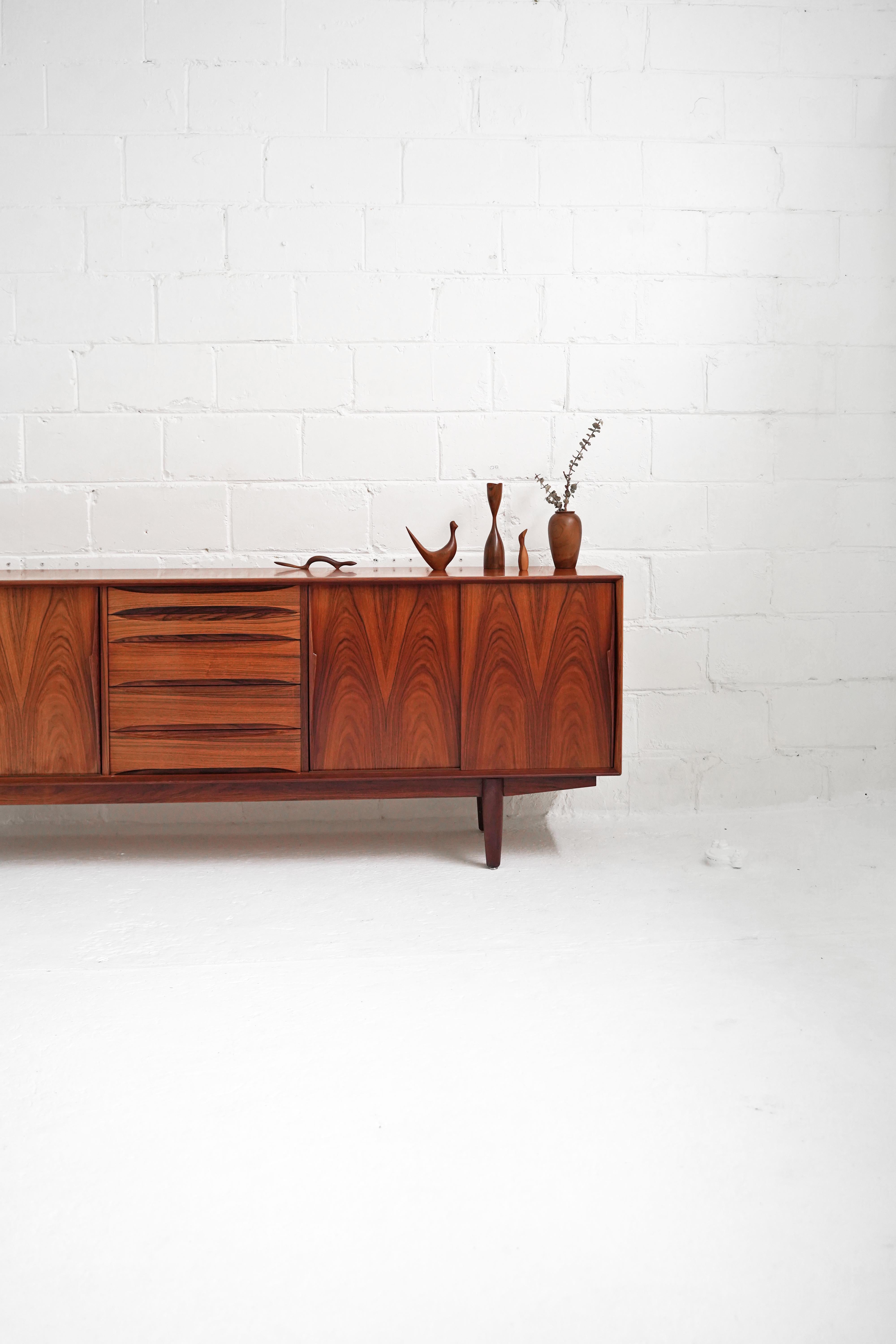 This stunning sideboard features gorgeous select bookmatched grain on top, front and side surfaces. In amazing vintage condition, with only darkening on side profiles, as shown in photos.