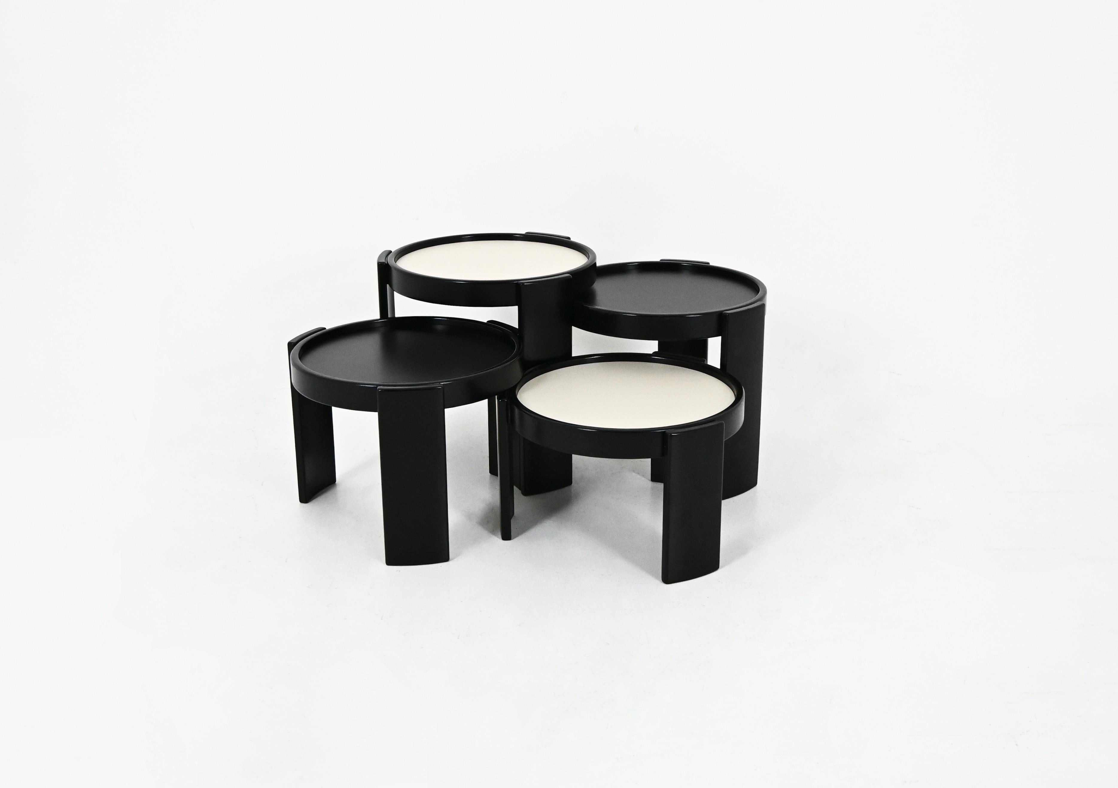 Set fo 4 Wooden nesting tables. Reversible black and white top. Stamped Cassina. Wear due to time and age of the tables.
Measures: Height Small: 25 cm
Height Medium 1: 29 cm
Height Medium 2: 34 cm
Height Large: 39 cm.
FOR SHIPPING, REQUEST US FOR