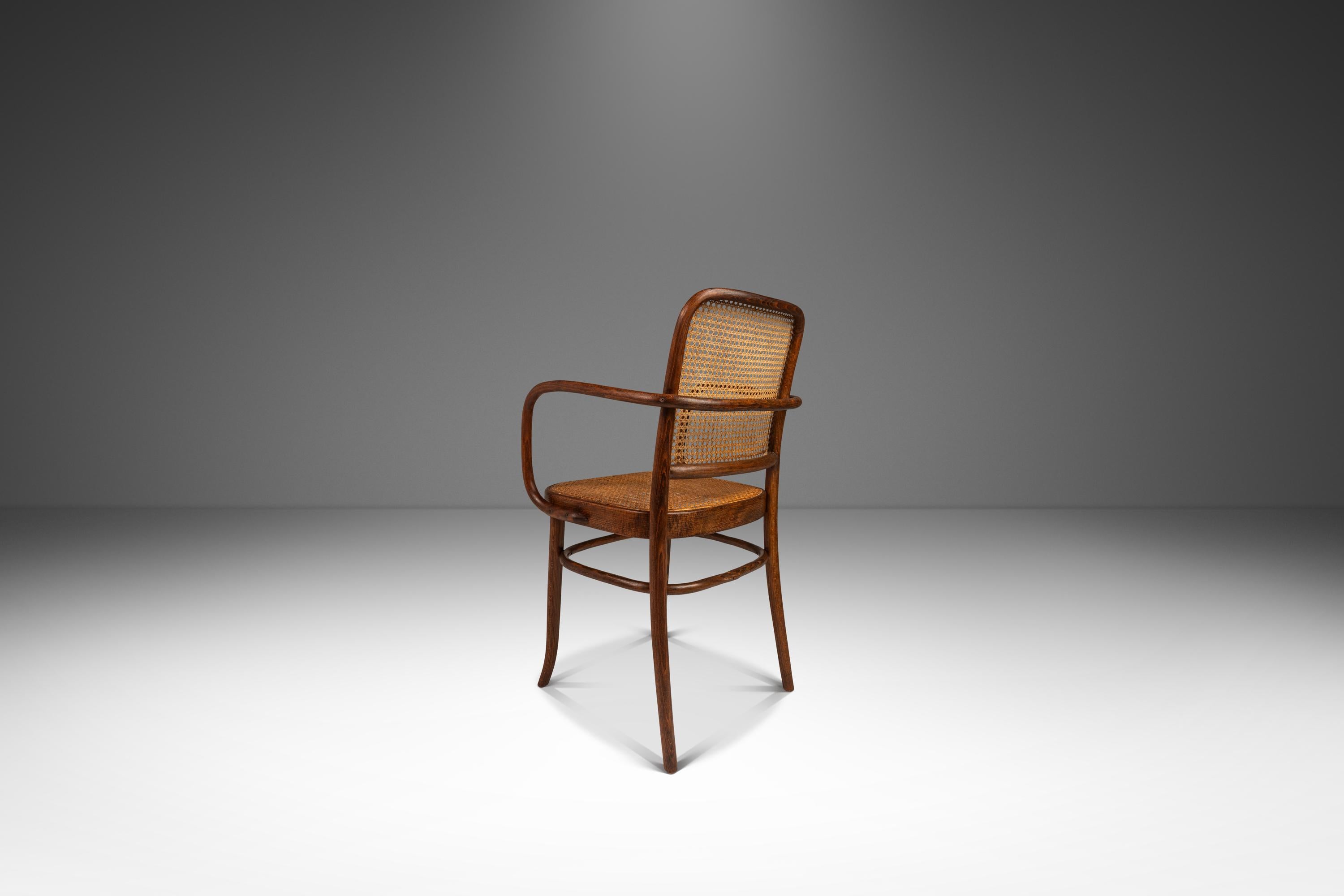 Introducing a rare and beautiful single bentwood Prague Model 811 armchair by the renowned designers Josef Frank and Josef Hoffmann for Stendig. Designed in the 1960s, this chair is a true representation of Mid-Century Modern design and