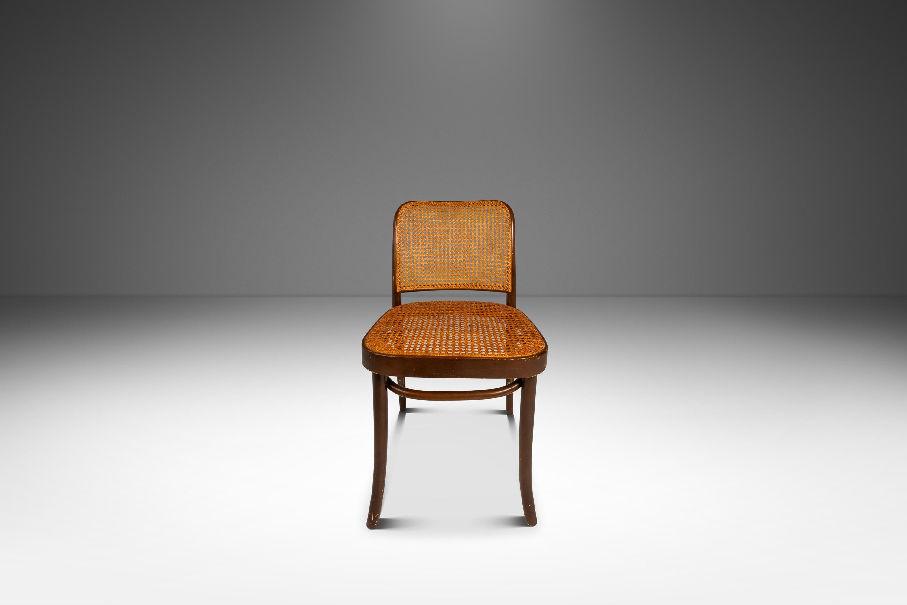 Introducing a rare and beautiful single bentwood Prague Model 811 side chair by the renowned designers Josef Frank and Josef Hoffmann for Stendig. Designed in the 1960s, this chair is a true representation of Mid-Century Modern design and