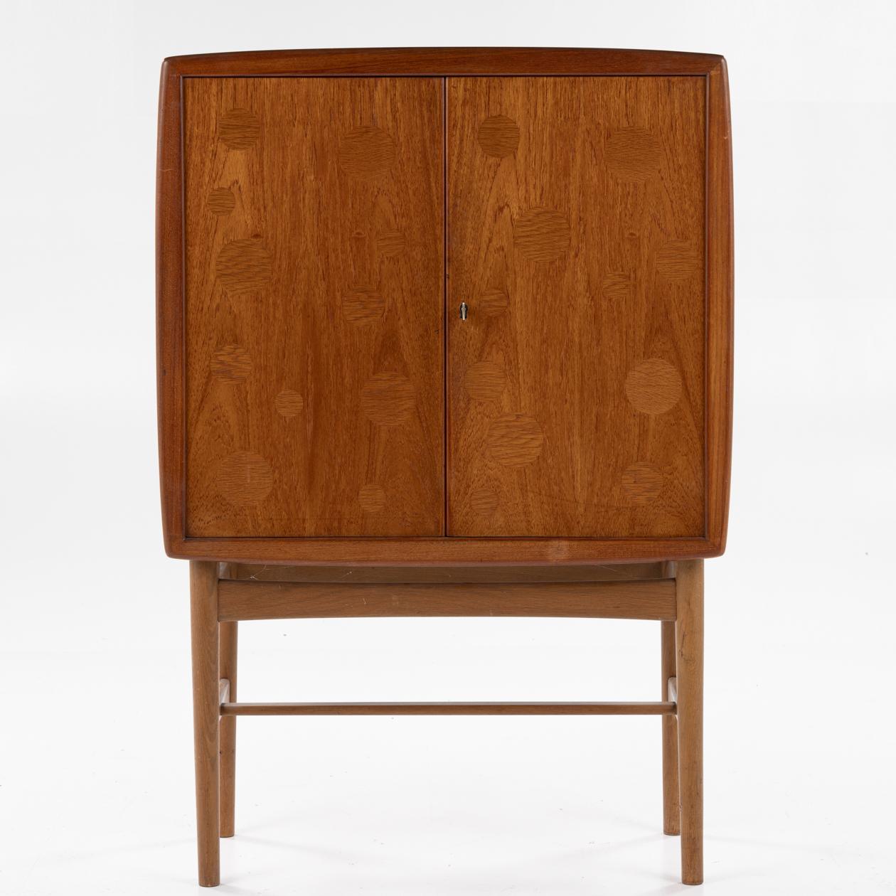 Oak Model 93 - Bar cabinet in teak and oak and doors with intarsia by Kurt Øservig