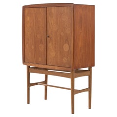 Model 93 - Bar cabinet in teak and oak and doors with intarsia by Kurt Øservig