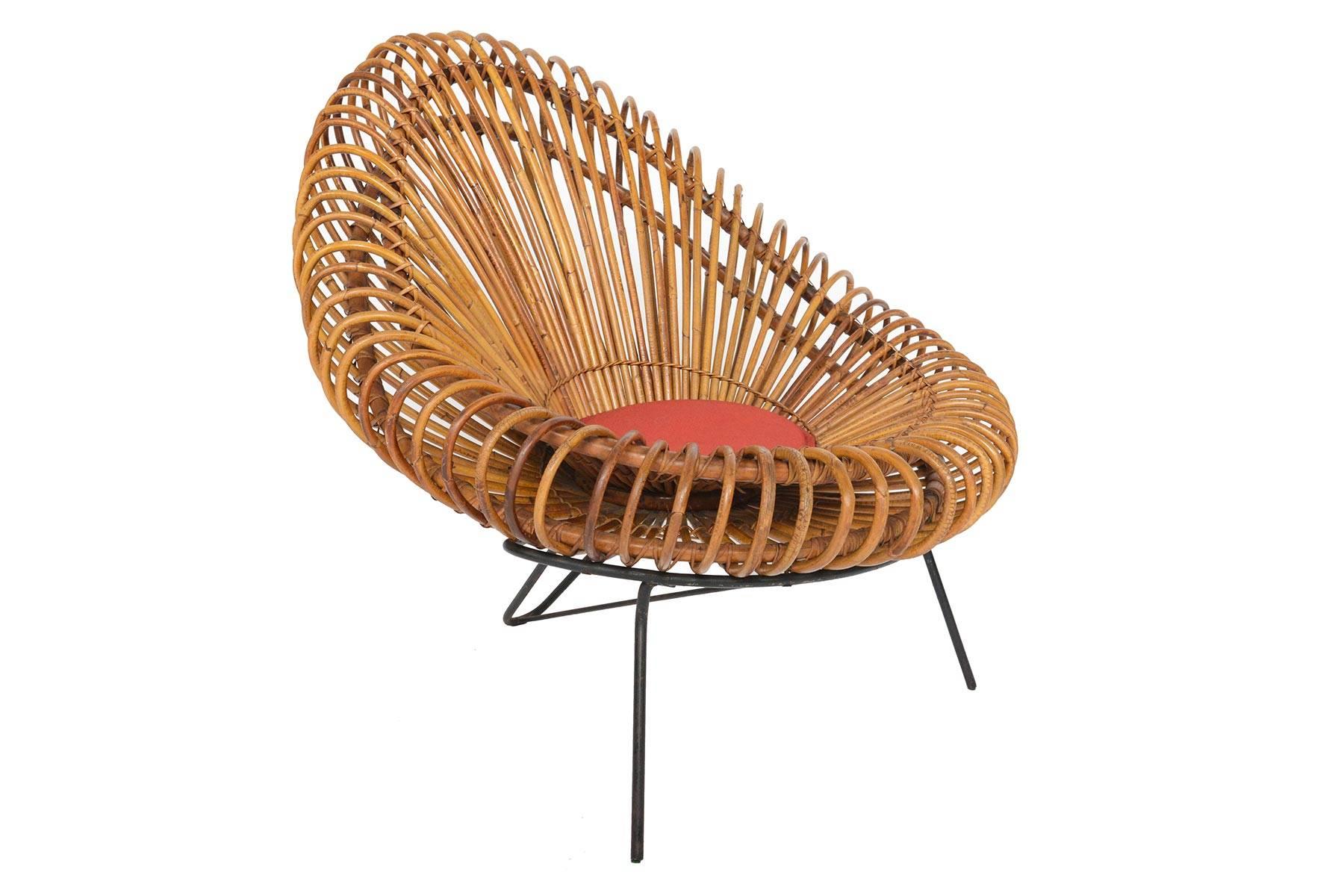 Rare and magnificent French modern basketware lounge chair designed by Janine Abraham & Dirk Jan Rol. Produced by edition Rougier in 1955. In excellent original condition.
  