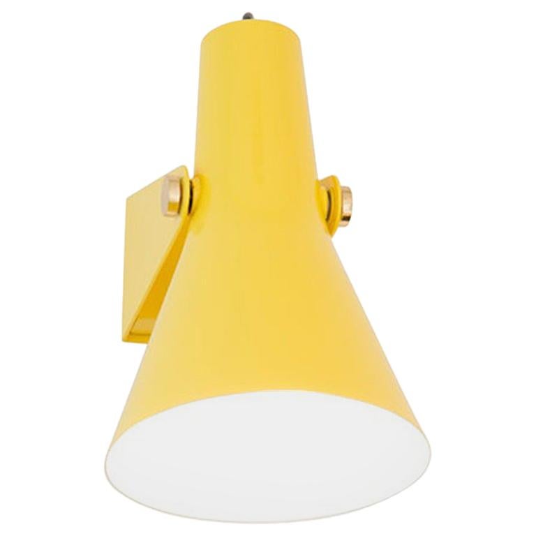 This lamp, originally designed as a floodlight before the invention of the spot light, gives a strong light that you can focus. It can project its light downward for reading and for room lighting, or be adjusted/swiveled upward to shine towards the