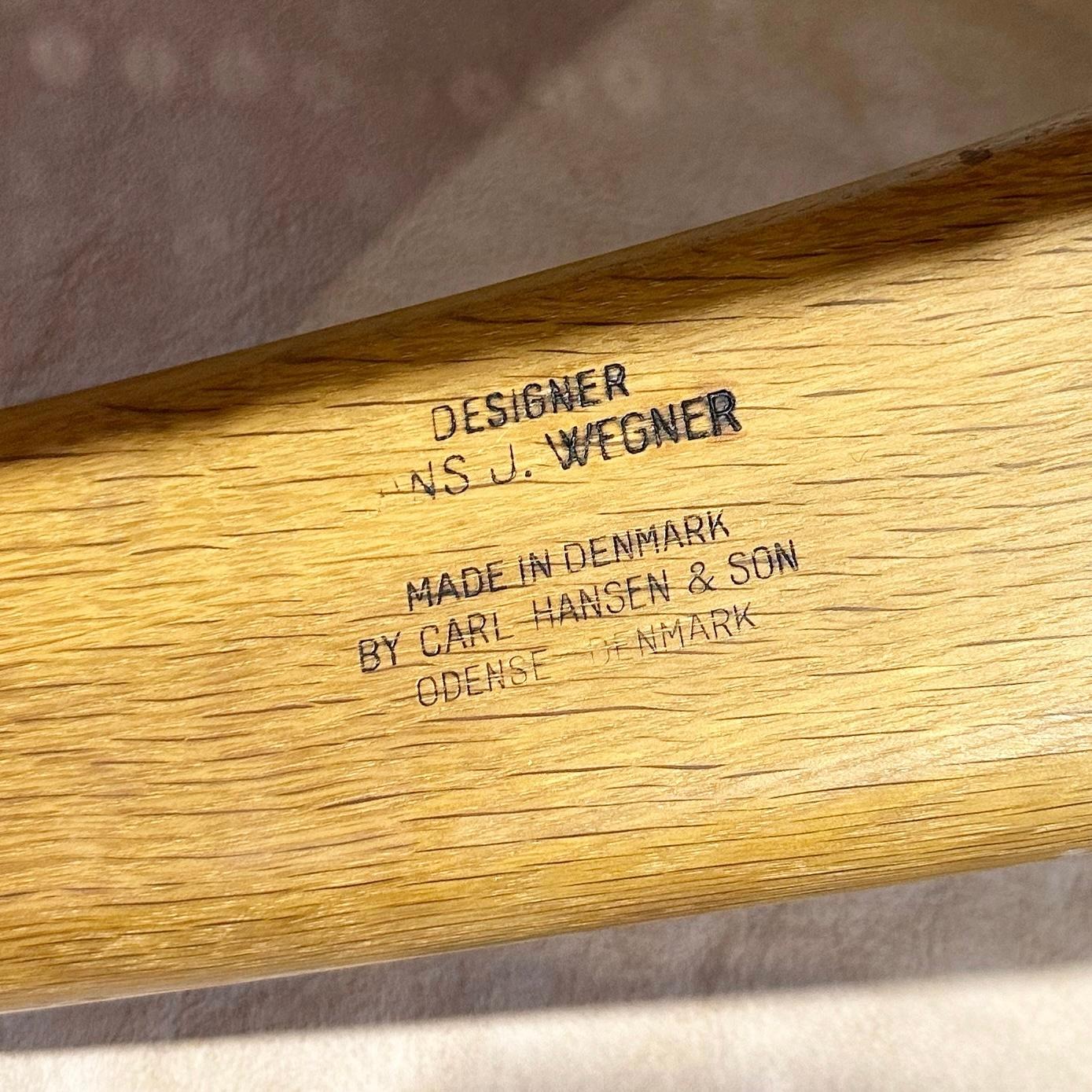 Love a Danish cord chair. These are quintessential Wegner pieces. Lots of copies out there, but these are the real deal. We added a pair of tan California sheepskins for a cozy seat.

Branded manufacturer's mark to underside of one example ‘Made in