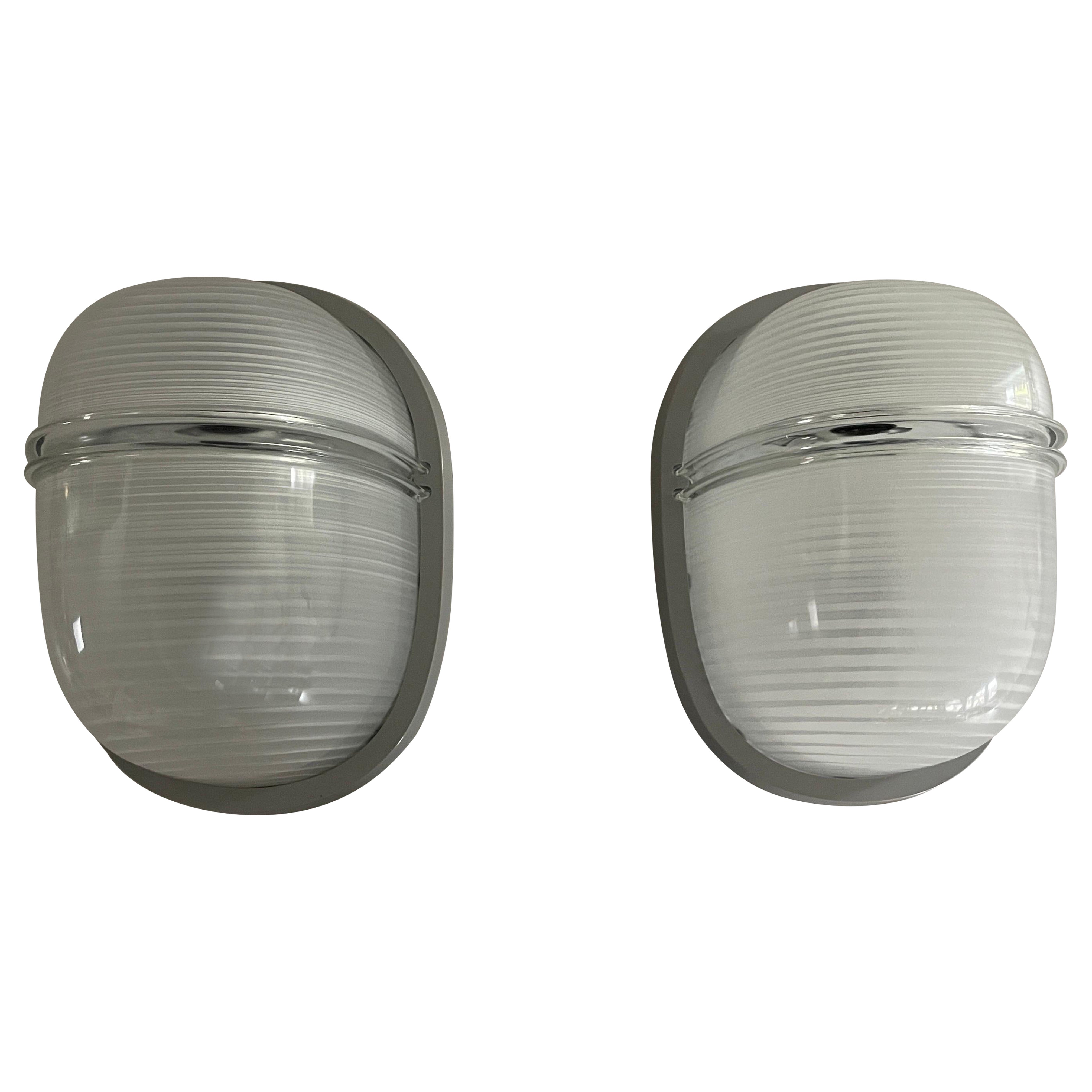 Modello Clipeo Rara coppia di applique di Eric Gottein per Artemide, anni 
70, Italia