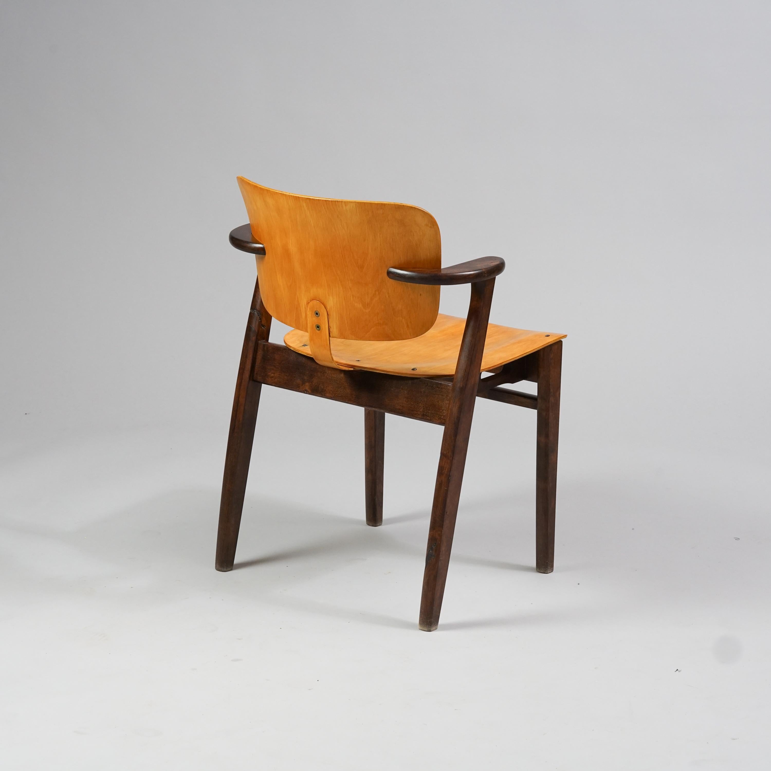 Model domus chair by Ilmari Tapiovaara from the 1950s. Birch. Completely restored. Ilmari Tapiovaara designed the domus chair originally in 1946 as a part of student residence Domus Academica's furniture.