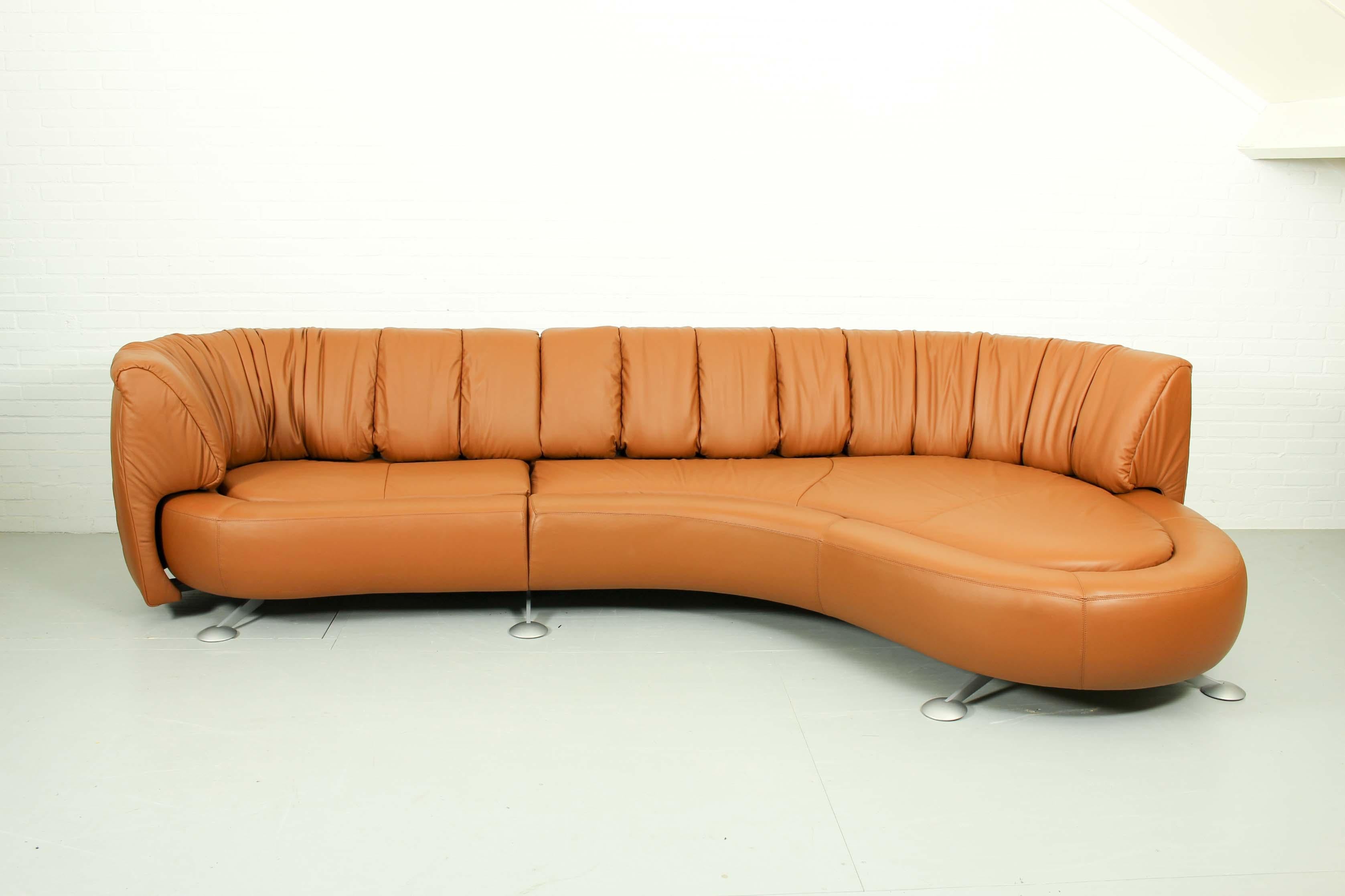 This modular sofa system was designed by Hugo de Ruiter for Swiss manufacturer De Sede. It was produced in 2011 and has been reupholstered recently with Elmosoft leather. This piece consists of two base parts with chromed feet and two movable