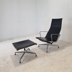 Model EA 124 + 125 Vitra Lounge Chair and Ottoman by Charles & Ray Eames