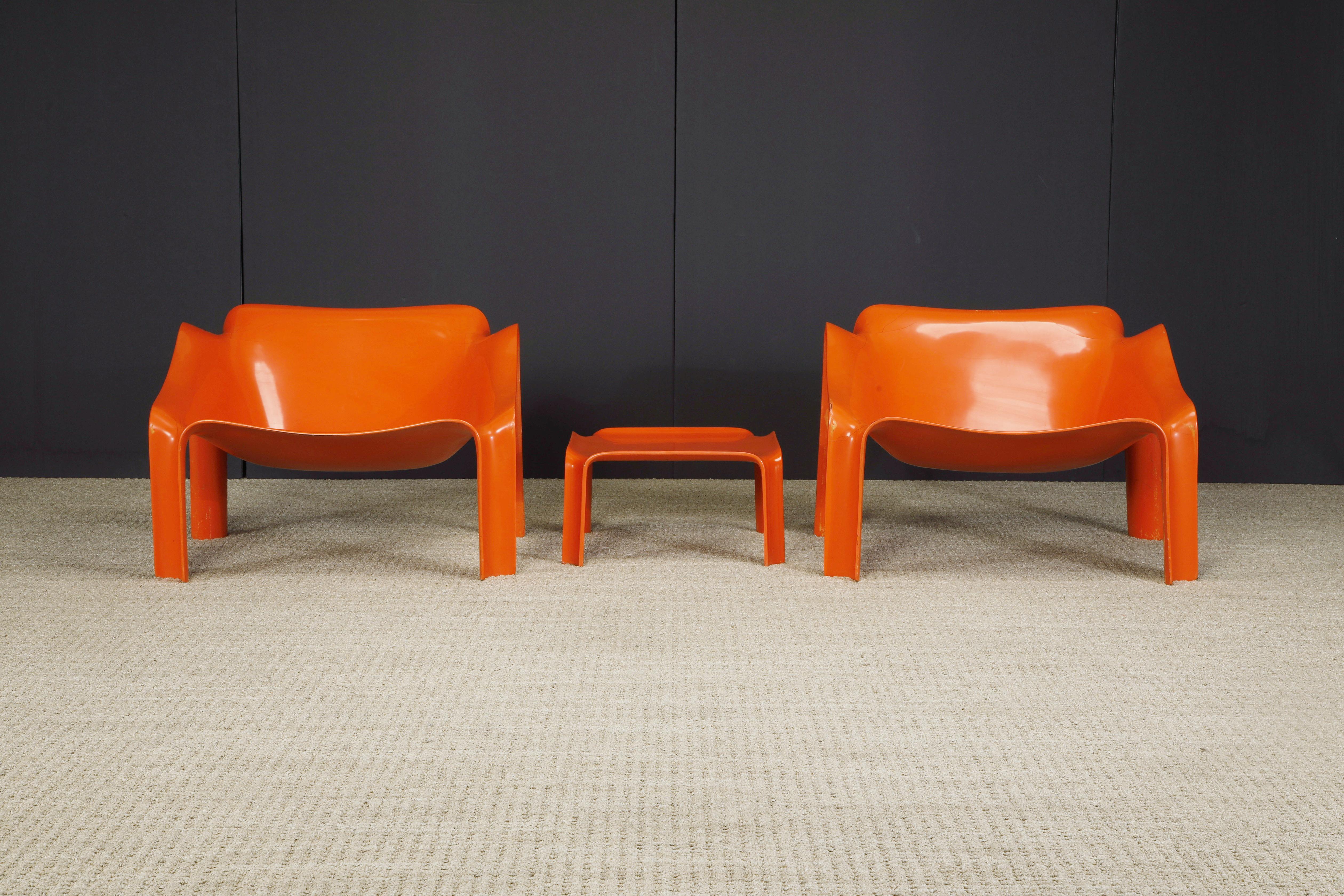 This groovy set of Model 'F303' lounge chairs (2) and side table (1) by Pierre Paulin for Artifort was designed in the 1970s and still an icon of 70s modern design to this day. This set was procured by Jim Walrod for The Standard Hotel in Downtown