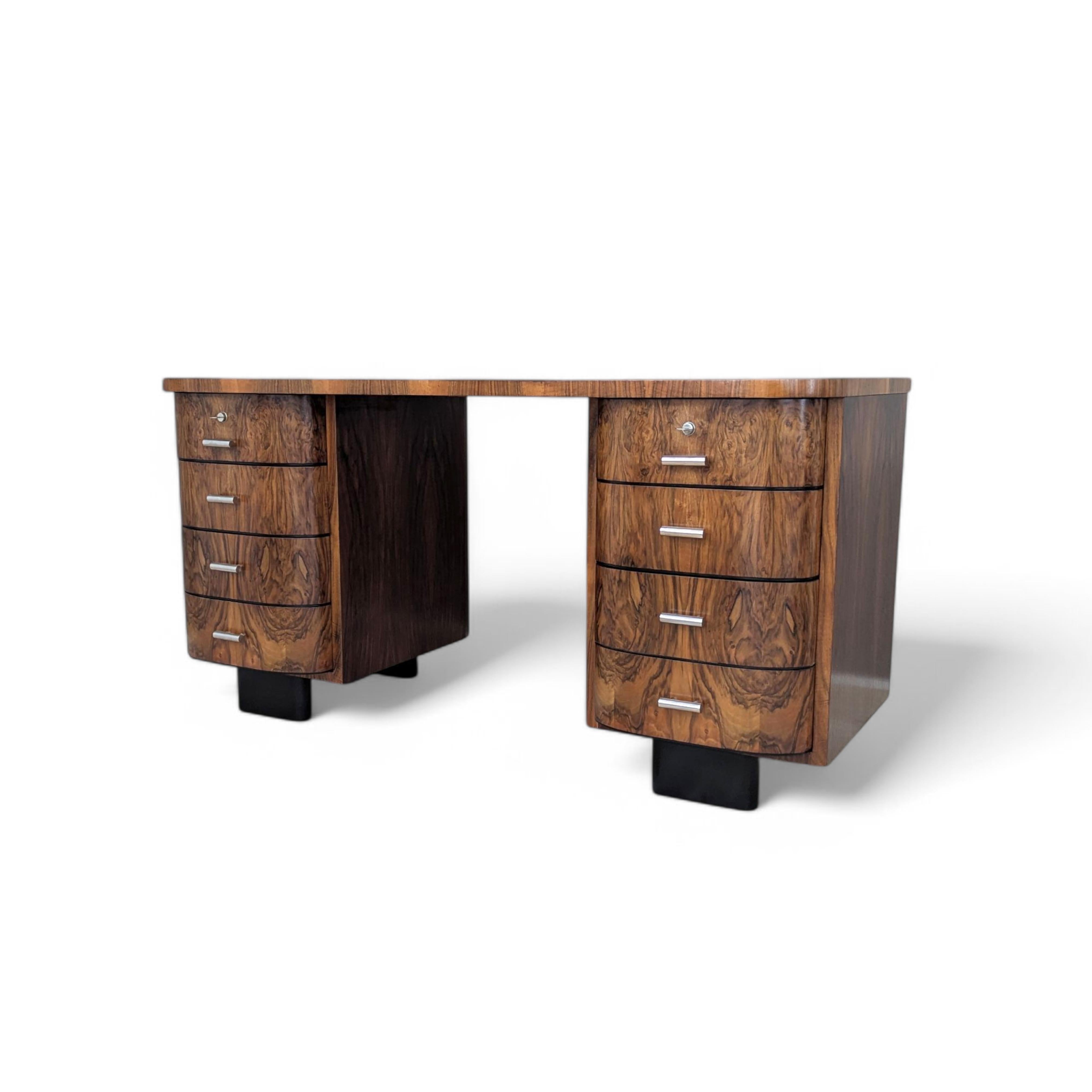 Designed by the renowned Czech designer Jindřich Halabala, the H-178 desk is one of the most elegant pieces of furniture produced by the UP Zavody workshop in the 1930s. More than just a functional piece, it is a significant work of design history