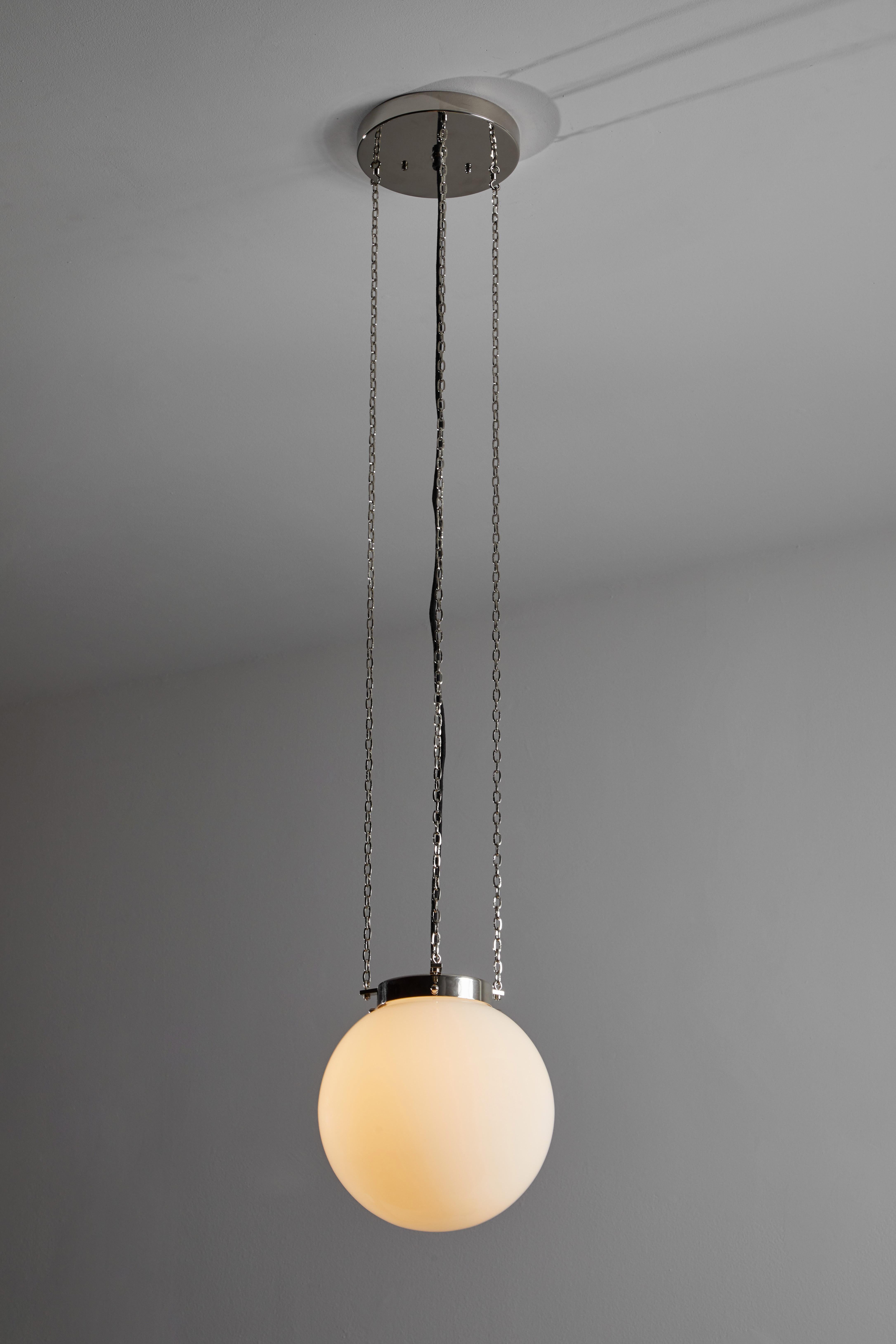 Model HMB 27/250 Bauhaus suspension light by Marianne Brandt. Originally manufactured in 1926. Current production manufactured in Germany by Tecnolumen. Nickel plated metal, opaque glass globe. Wired for U.S junction boxes. Takes one E 27 75W