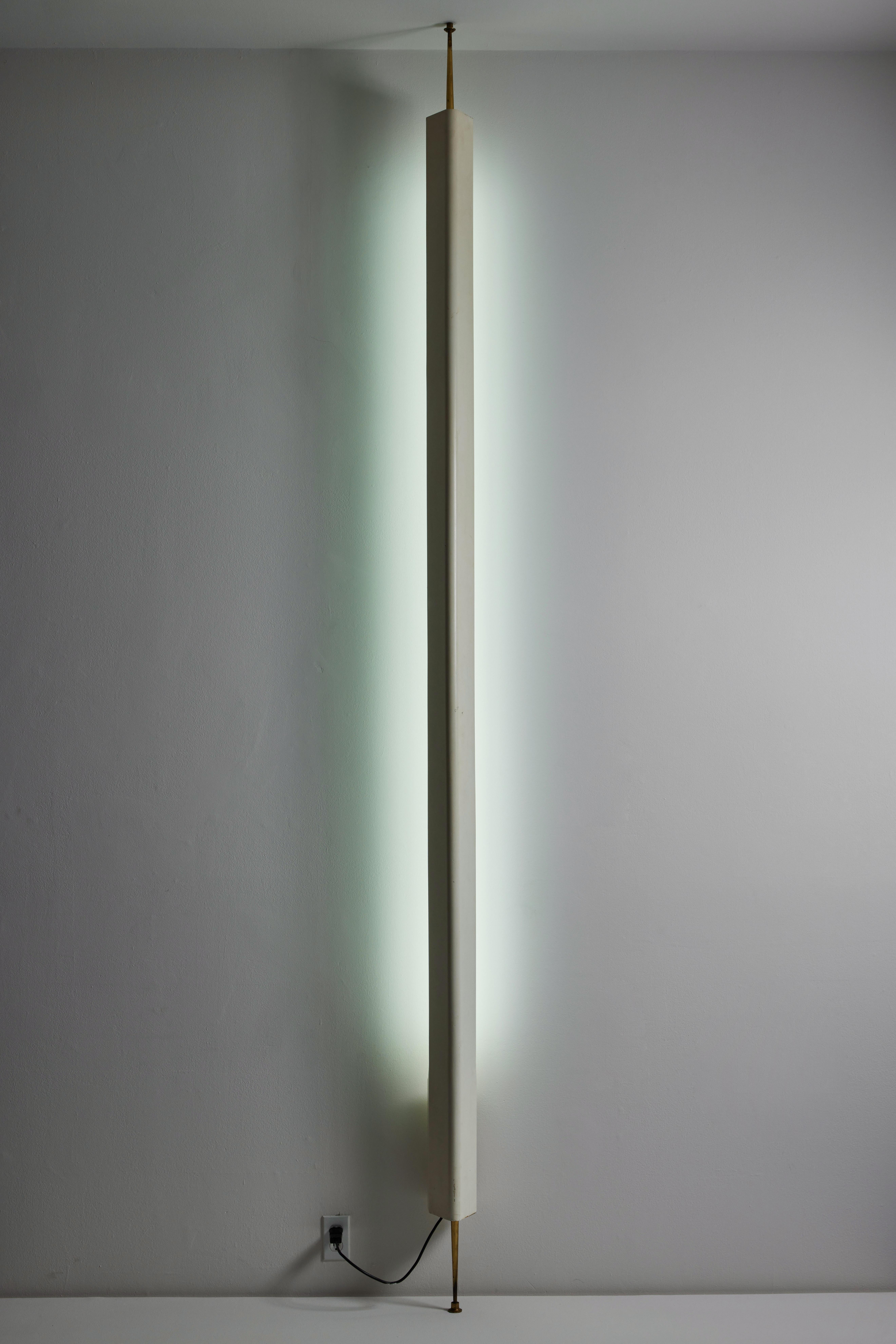 Model LT8 floor lamp by Osvaldo Borsani. Designed and manufactured in Italy, circa 1950s. Enameled metal, brass. Original European cord We recommend two Neon Fluorescent tubes. Bulbs included. Designed for the X edition of the Triennale di Milano. 

