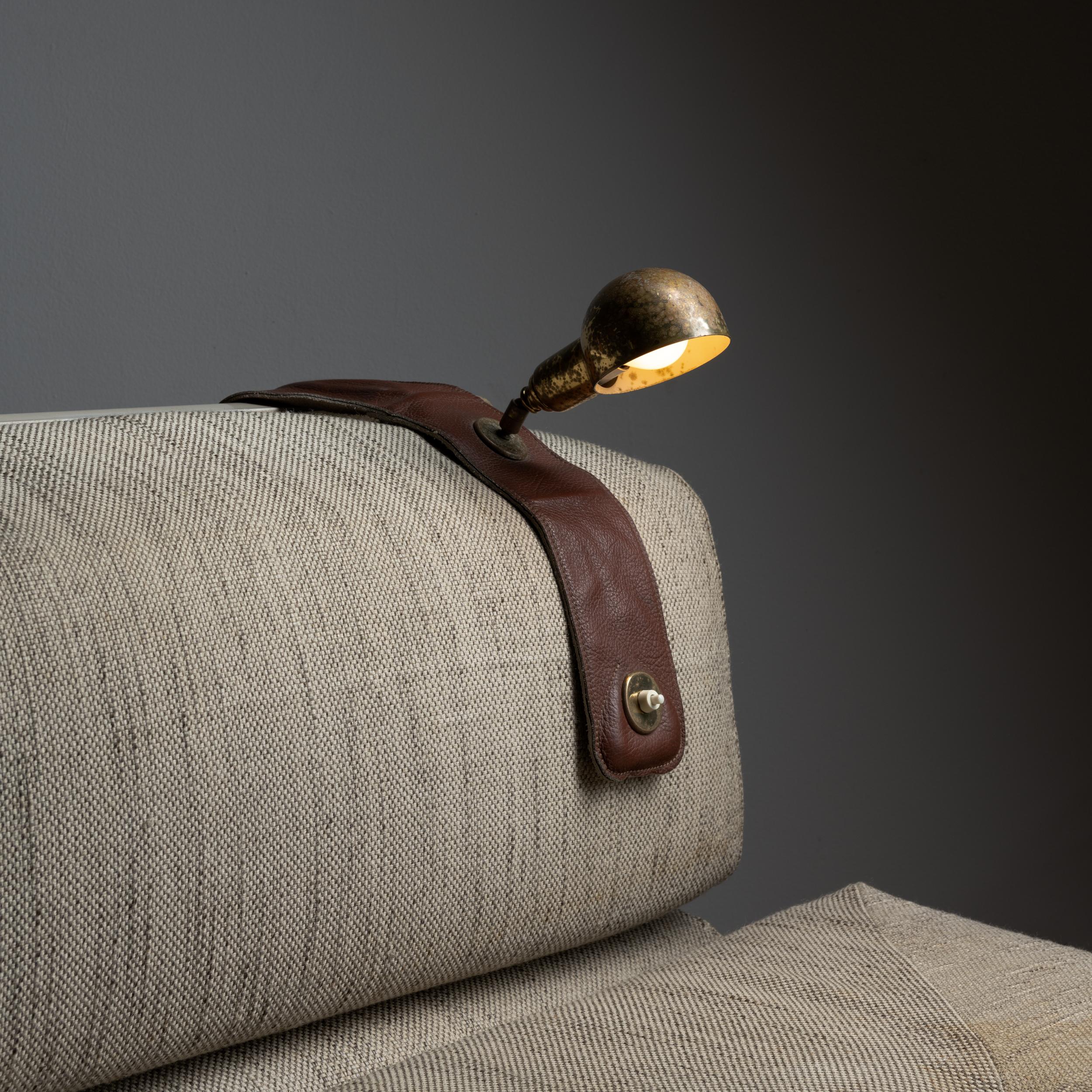 Model Lp01 armchair lamp by Luigi Caccia Dominioni for Azucena. Designed and manufactured in Italy, circa 1970s. Leather and brass. Brass shade adjust to various positions. We recommend one E27 40w maximum bulb. Bulb provided as a one time courtesy.