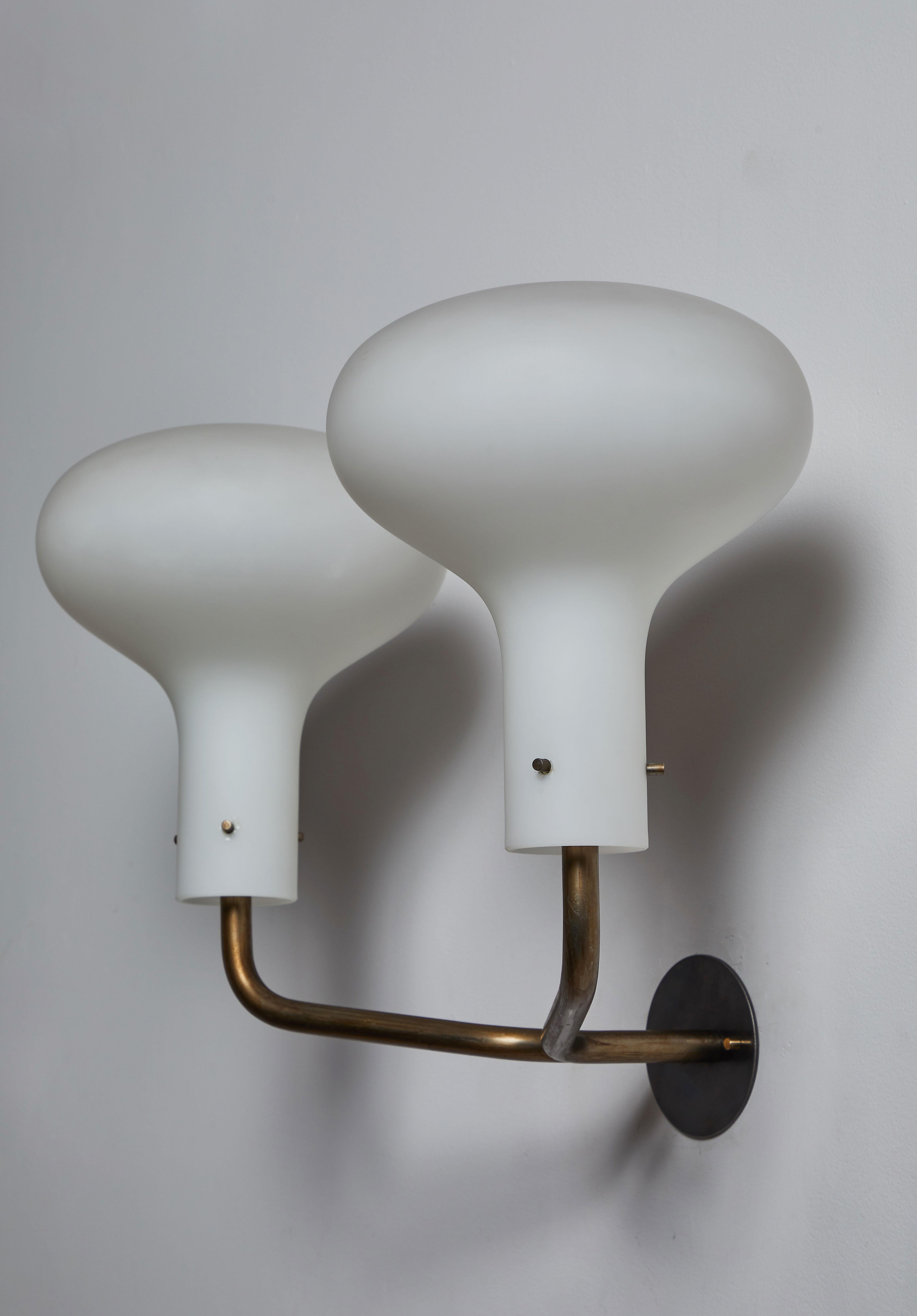 Pair of double-arm model Lp12 galleria sconces by Ignazio Gardella for Azucena. Designed and manufactured in Italy, 1958. Brass and brushed satin glass diffusers. Rewired for US junction boxes. Each light takes one E27 75w maximum bulb.