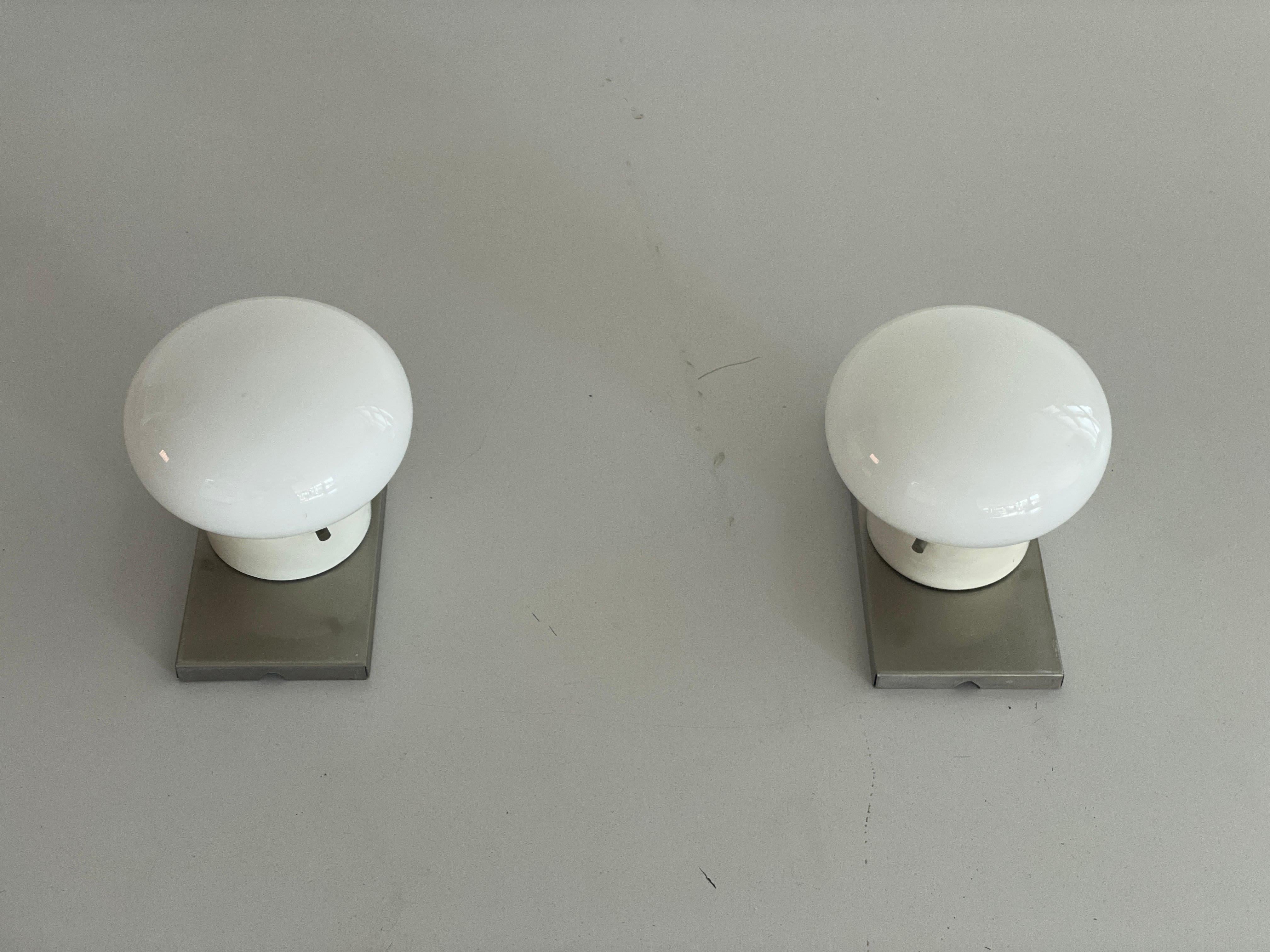 Italian Model Modulo Glass and Chrome Pair of Wall Lamps by S.T. Valenti, 1970s, Italy For Sale
