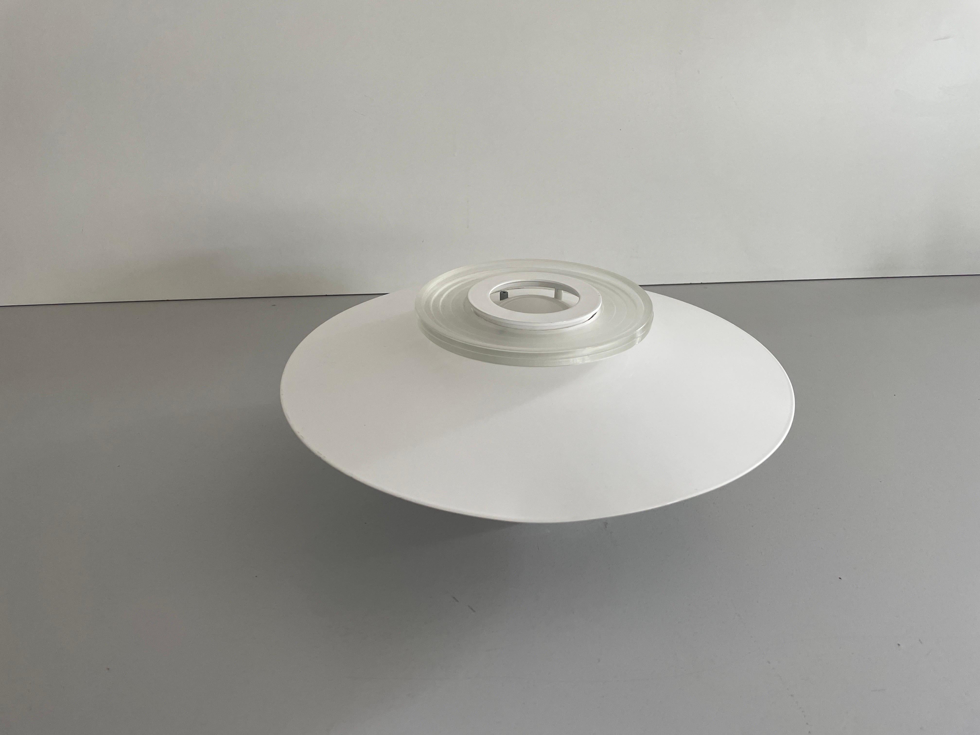 Model Moni' 1190 - 1200 ceiling lamp by Achille Castiglioni for Flos, 1960s, Italy

Lampshade is in very good vintage condition.

This lamp works with E14 light bulbs. 
Wired and suitable to use with 220V and 110V for all