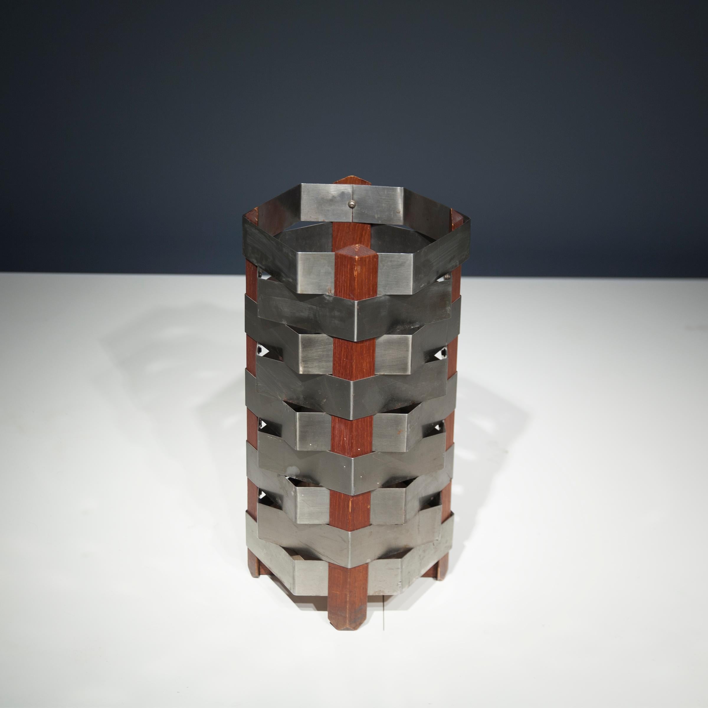 Model no. 1701 umbrella stand by Ico Parisi, Italy, 1959, in teak and stainless steel, manufactured by Stildomus, Rome.