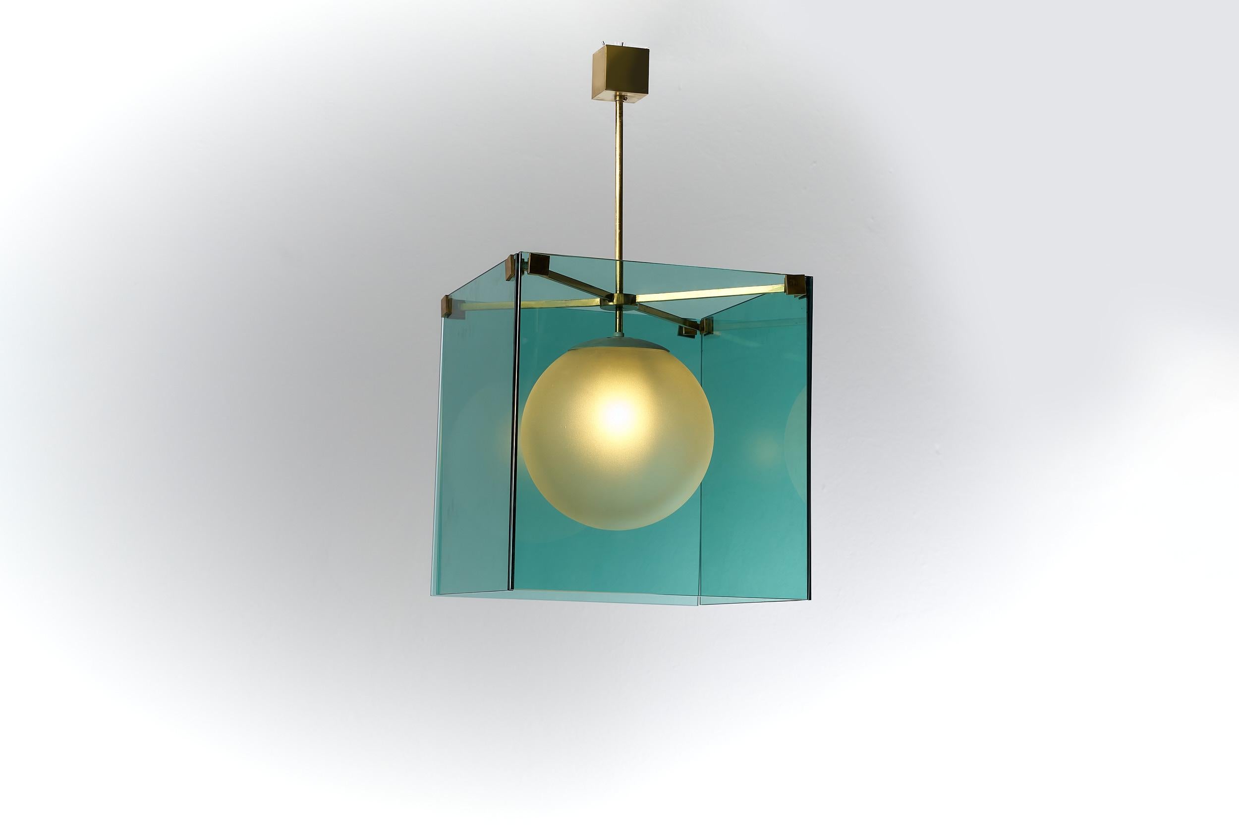 Embodying Max Ingrand's signature elegance, this ceiling light marries functionality and aesthetics. Crafted during his directorship at Fontana Arte, it showcases his skilled use of satin glass and polished brass. The layered design creates an